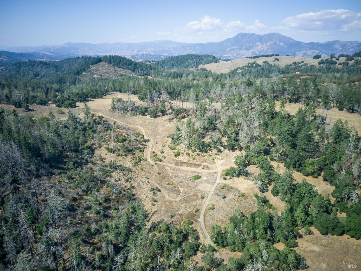 6583 St Helena Road Santa Rosa, CA 95404 - Photo 60 of 71 an aerial view of mountains residential house and green space