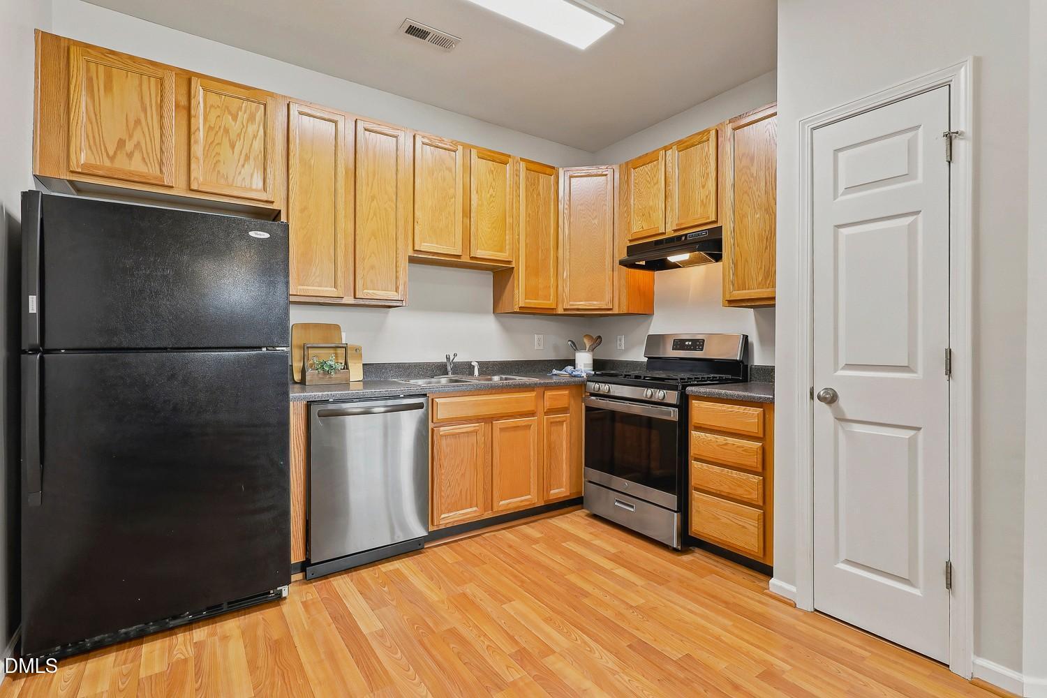 8620 Neuse Club Lane, Unit 107 Raleigh, NC 27616 - Photo 11 of 33 011-024-Kitchen-1500x1000