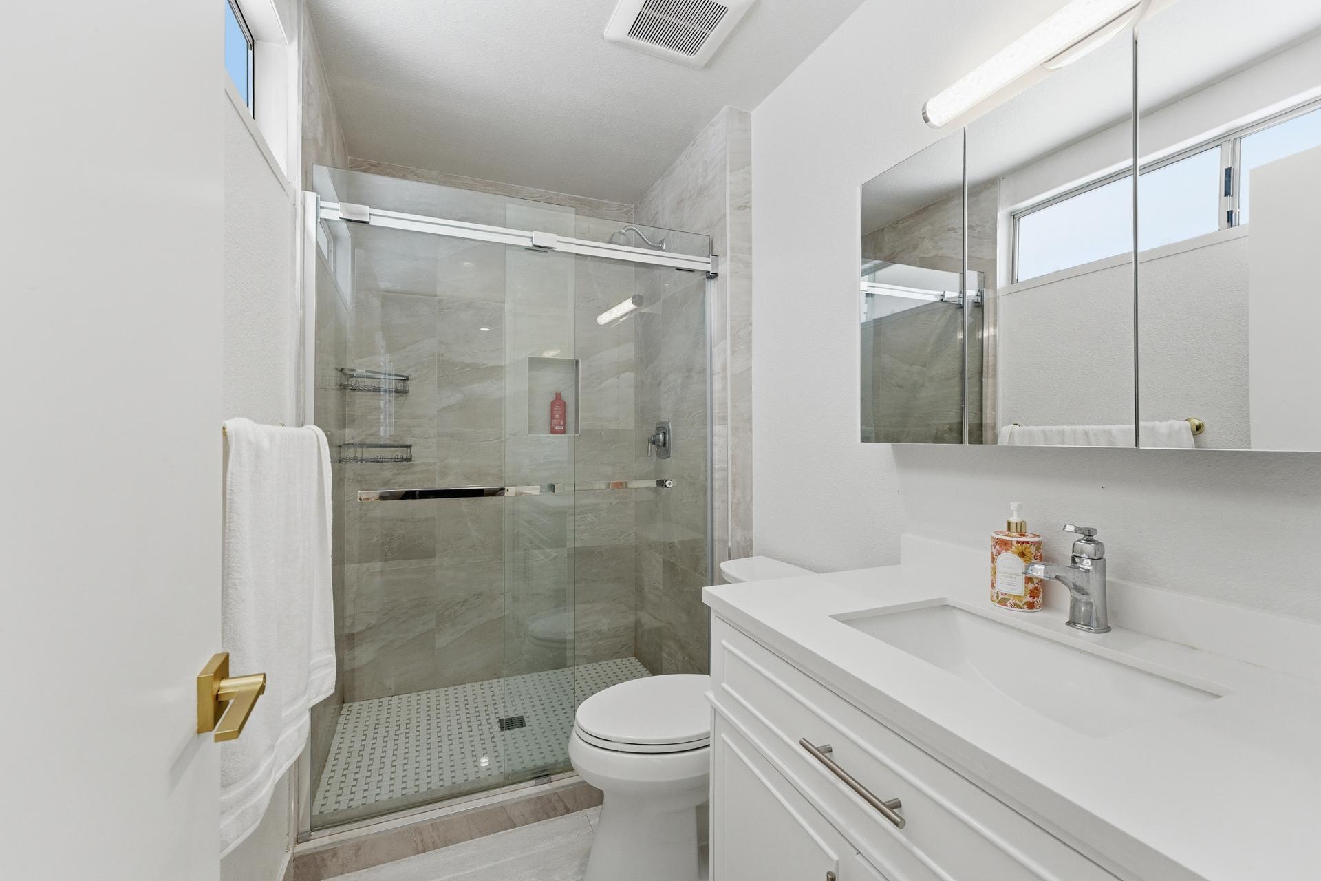 40961 Cecina Way Bermuda Dunes, CA 92203 - Photo 16 of 27 a bathroom with a sink toilet and shower