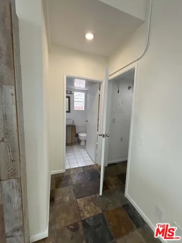 a bathroom with a sink and a shower