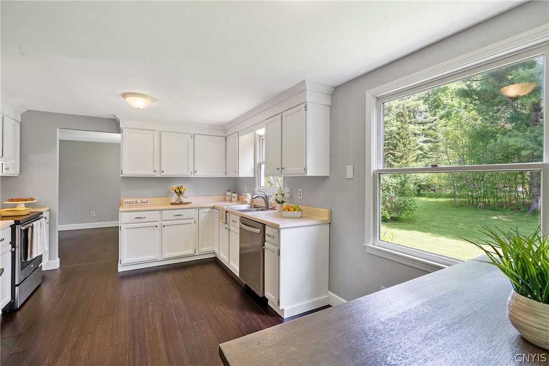 8841 Wandering Way Lysander, NY 13027 - Photo 16 of 42 Abundant cabinetry & a functional layout!