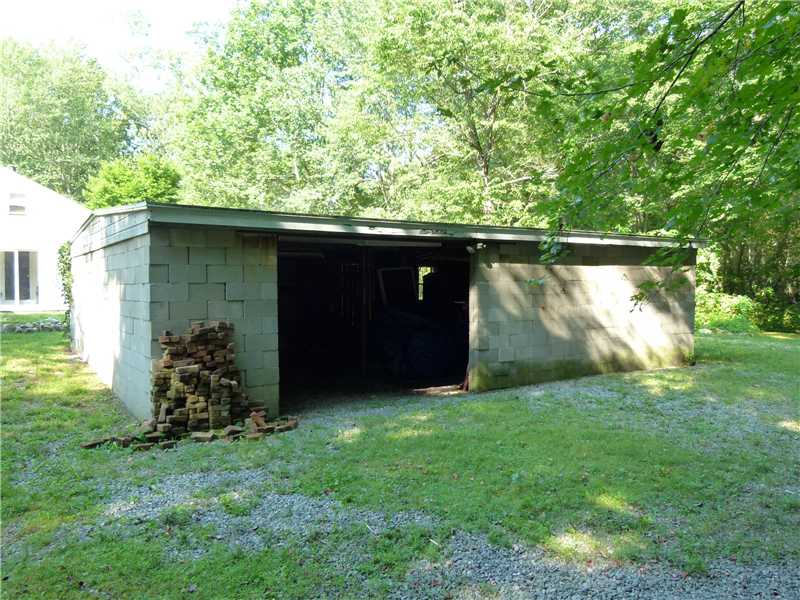 1422 Middle Road East Greenwich, RI 02818 - Photo 21 of 25 Parking Lot/Garage. 21x32 dry laid cinderblock garage with large opening, power, but no overhead door.
