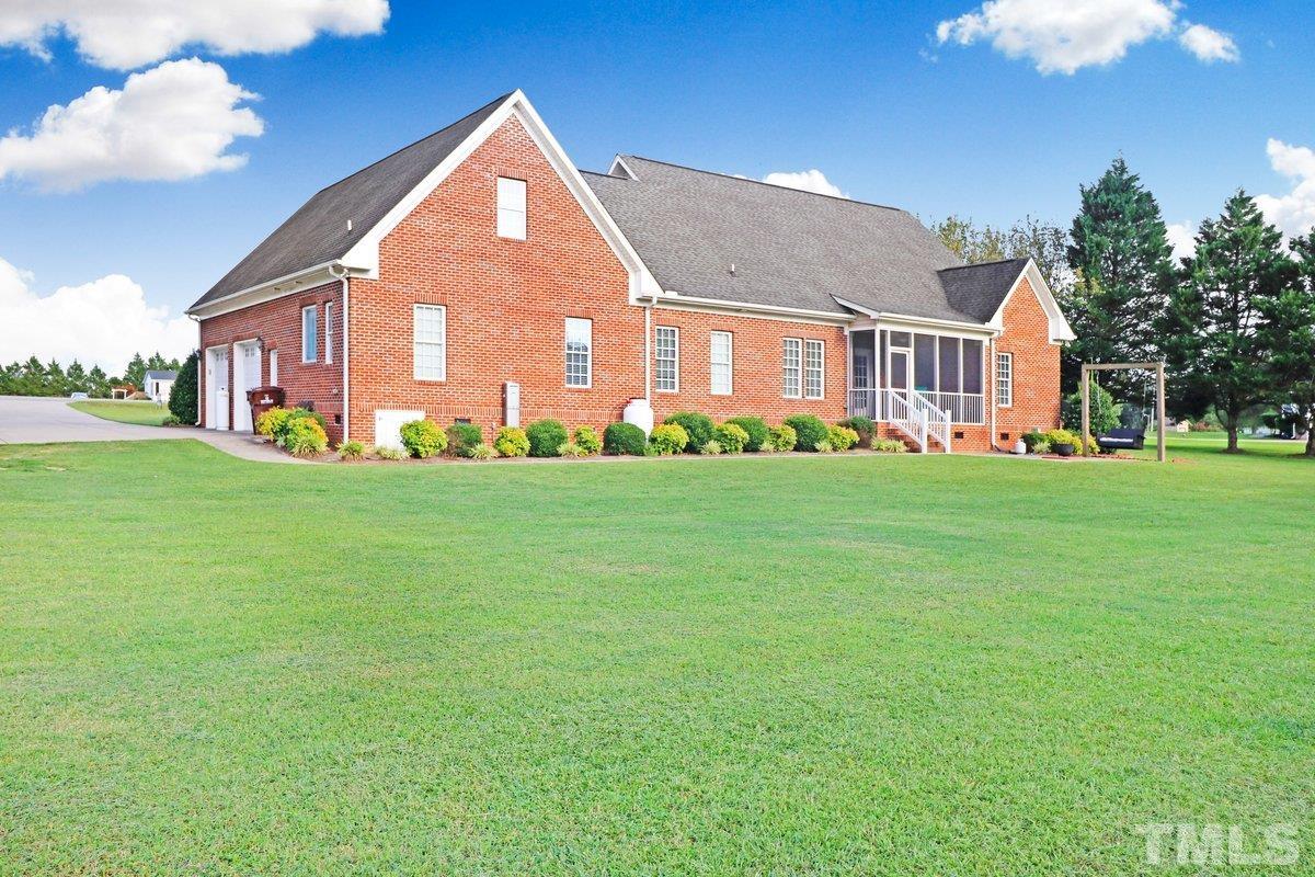 2899 Benson Hardee Road Benson, NC 27504 - Photo 26 of 31 a front view of house with a garden