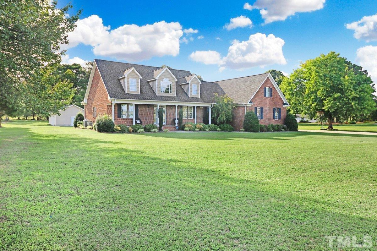 2899 Benson Hardee Road Benson, NC 27504 - Photo 28 of 31 a view of a house with a big yard
