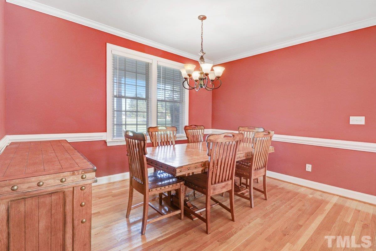 2899 Benson Hardee Road Benson, NC 27504 - Photo 9 of 31 a view of a dining room with furniture and window