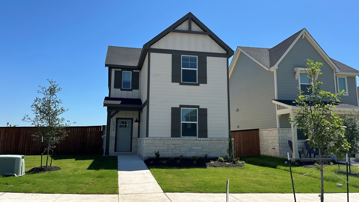 2829 Caleb Asher Loop Round Rock, TX 78665 - Photo 1 of 1 a front view of a house with a yard