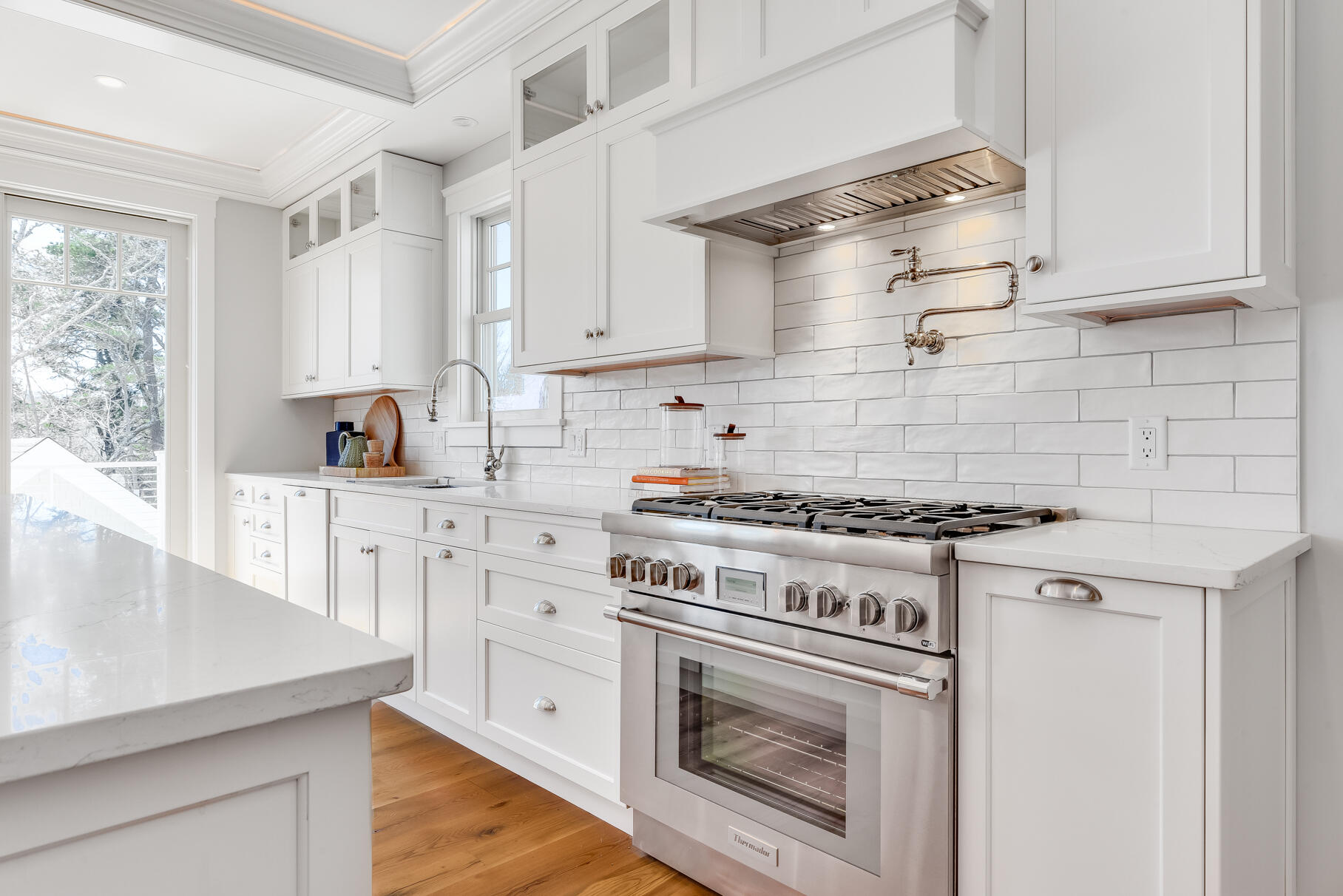 159 Sesuit Neck Road East Dennis, MA 02641 - Photo 24 of 78 a kitchen with cabinets a stove and a sink