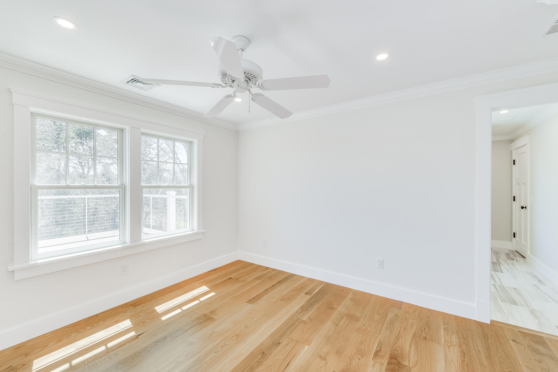 159 Sesuit Neck Road East Dennis, MA 02641 - Photo 47 of 78 wooden floor in an empty room with a window