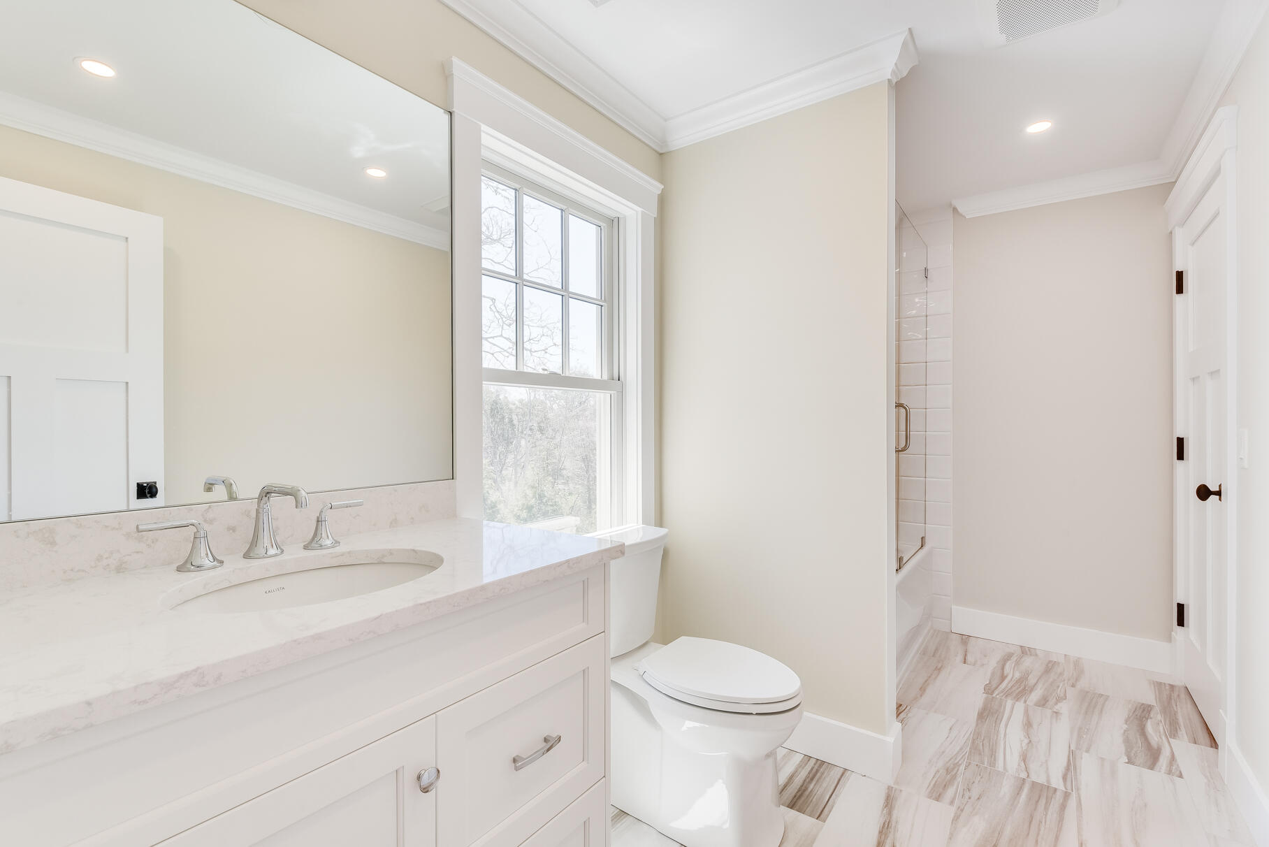 159 Sesuit Neck Road East Dennis, MA 02641 - Photo 48 of 78 a bathroom with a sink a toilet and a window