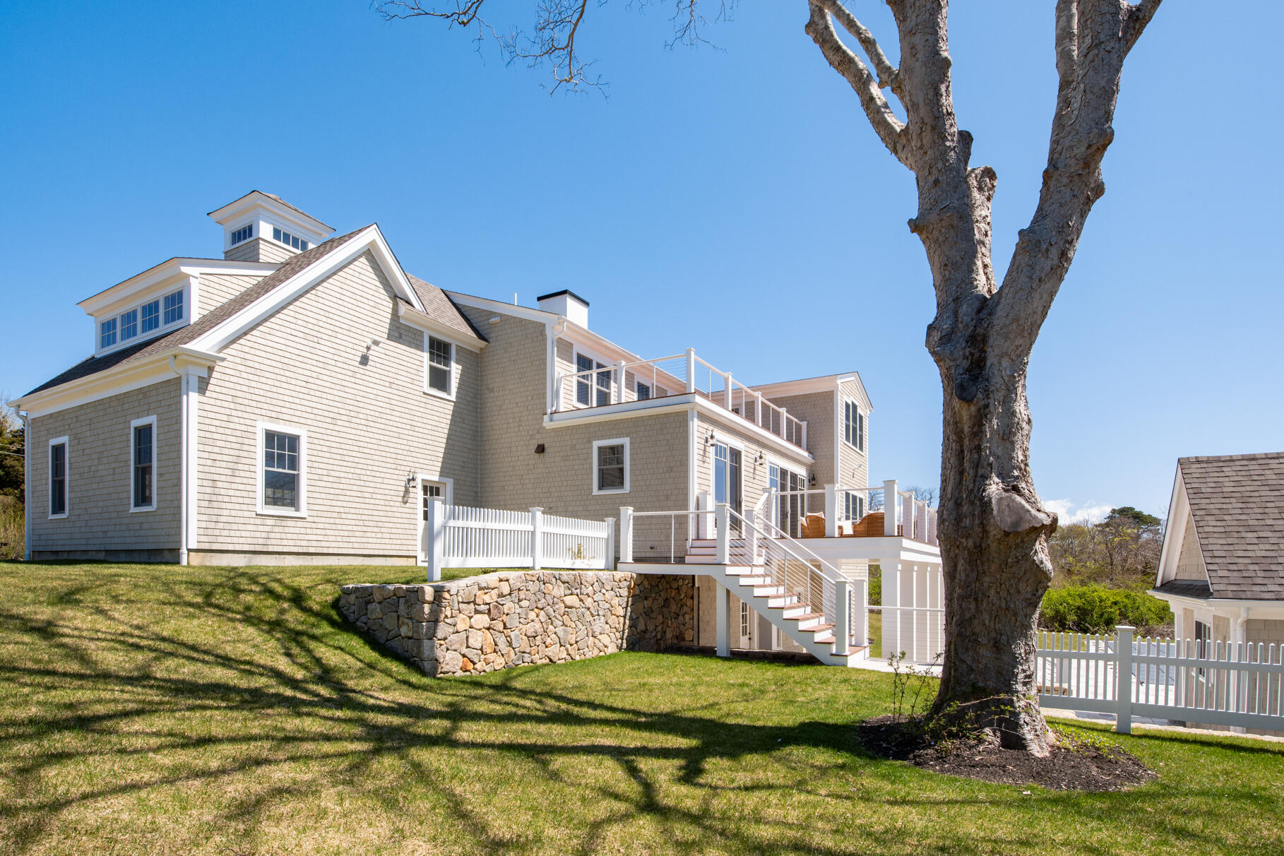 159 Sesuit Neck Road East Dennis, MA 02641 - Photo 5 of 78 a view of a house with a big yard
