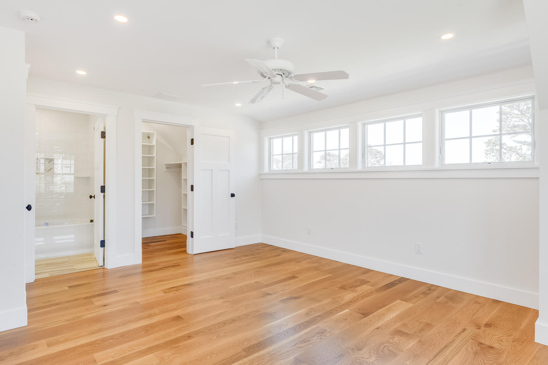 159 Sesuit Neck Road East Dennis, MA 02641 - Photo 51 of 78 a view of an empty room with wooden floor and a window
