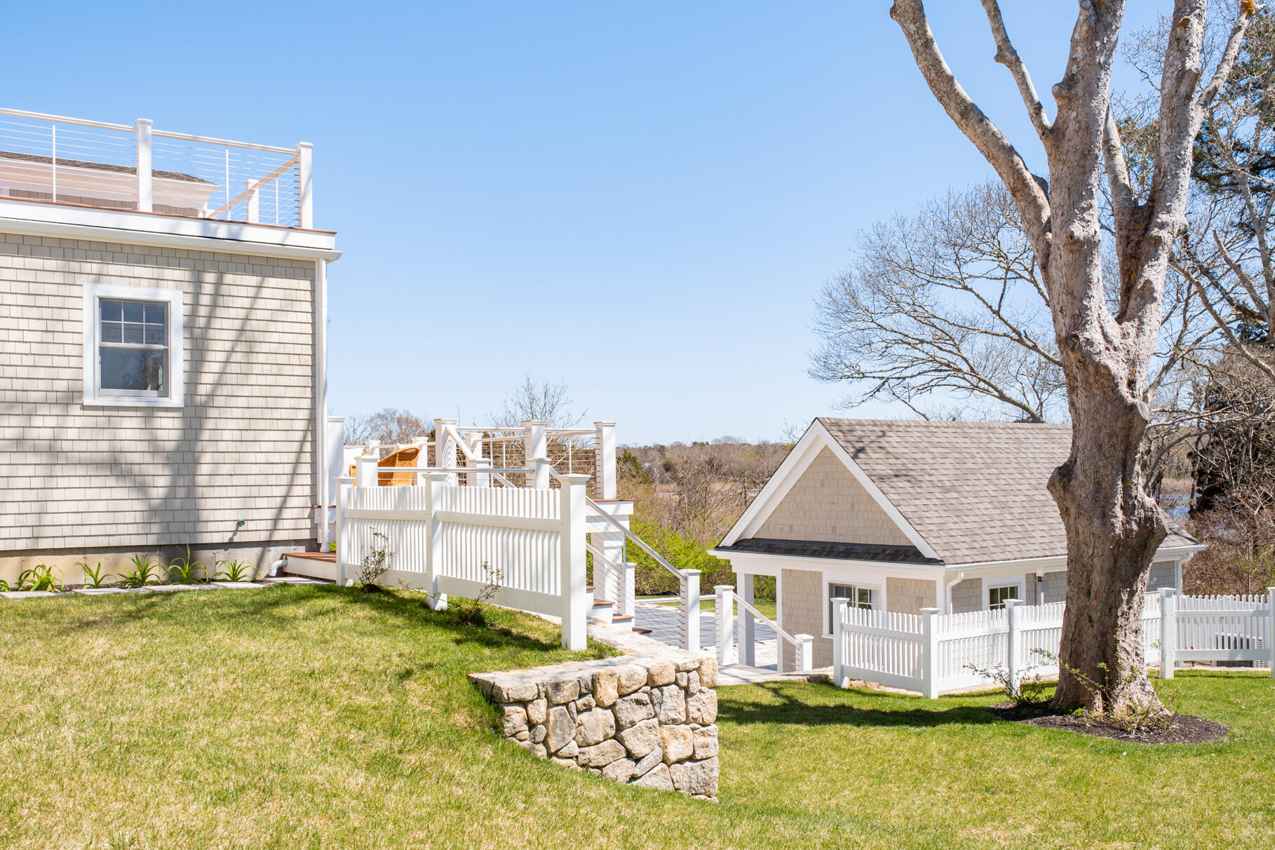 159 Sesuit Neck Road East Dennis, MA 02641 - Photo 64 of 78 a spacious bathroom with a tub and large windows