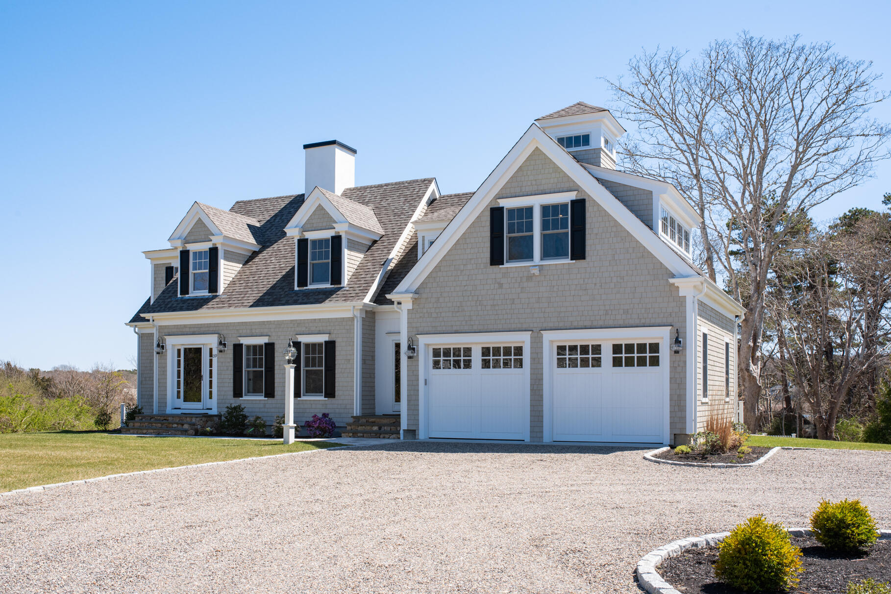 159 Sesuit Neck Road East Dennis, MA 02641 - Photo 65 of 78 a front view of a house with a yard