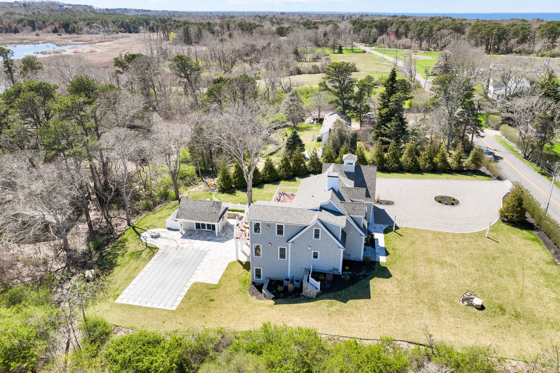 159 Sesuit Neck Road East Dennis, MA 02641 - Photo 69 of 78 an aerial view of a house with a yard