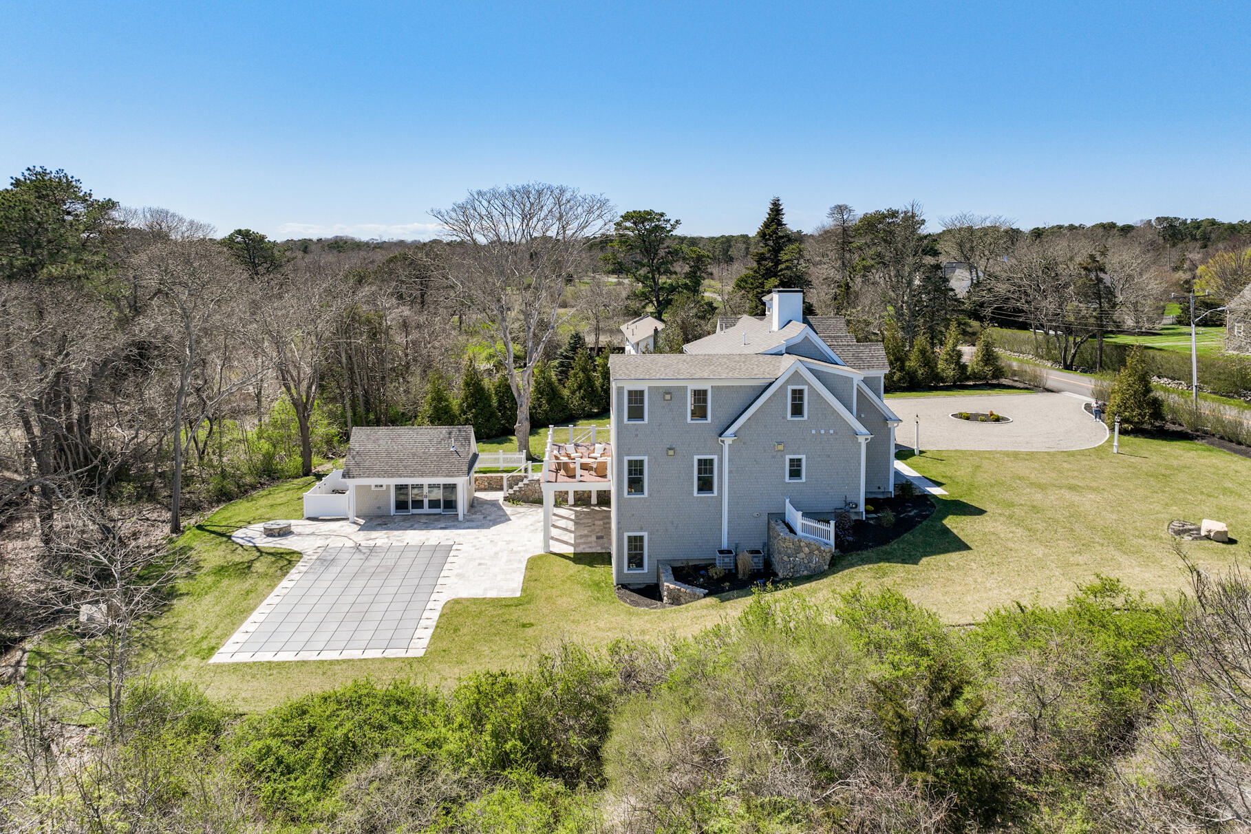 159 Sesuit Neck Road East Dennis, MA 02641 - Photo 70 of 78 an aerial view of a house with yard swimming pool and mountain view