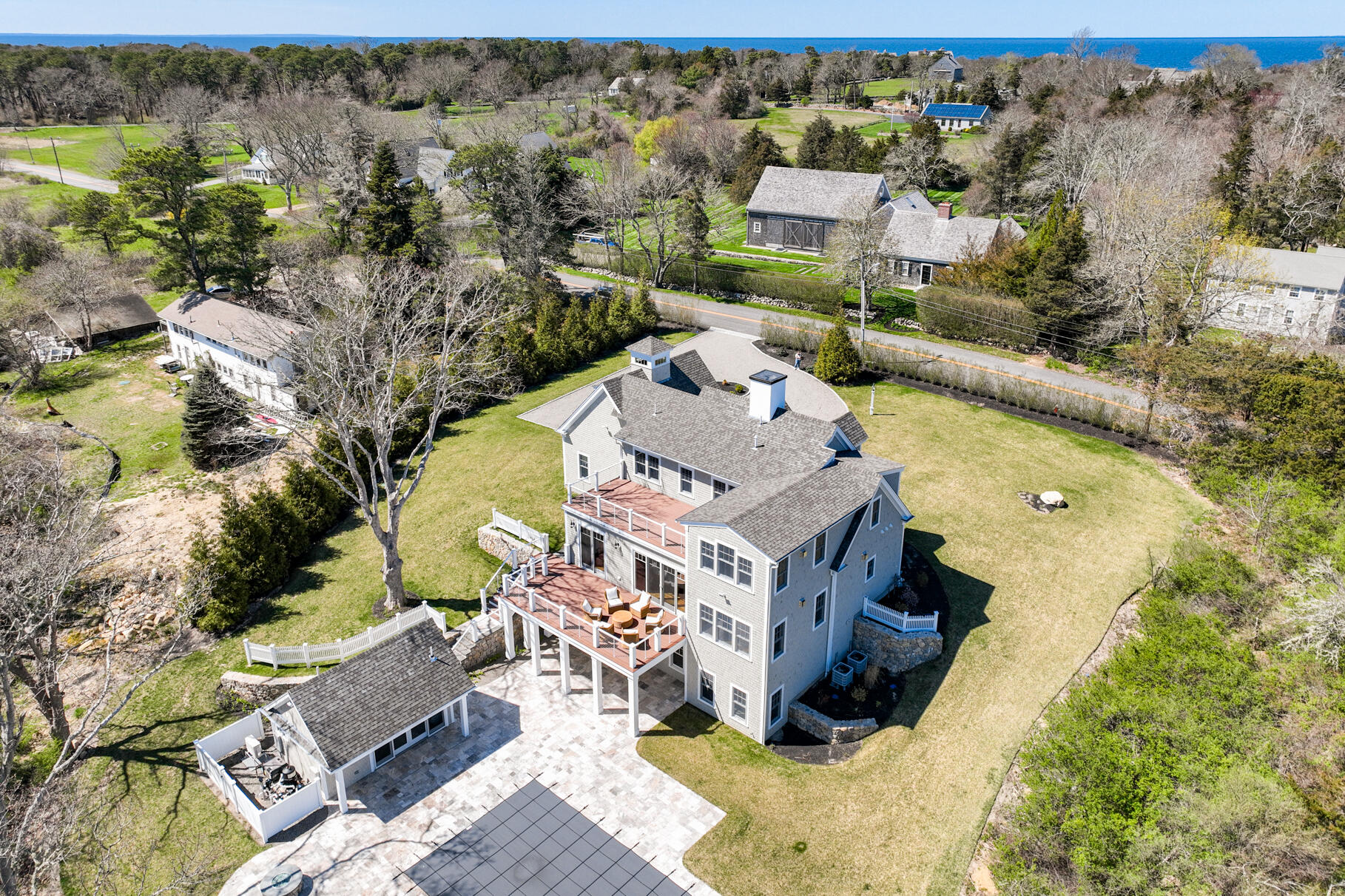 159 Sesuit Neck Road East Dennis, MA 02641 - Photo 72 of 78 an aerial view of a house with a swimming pool