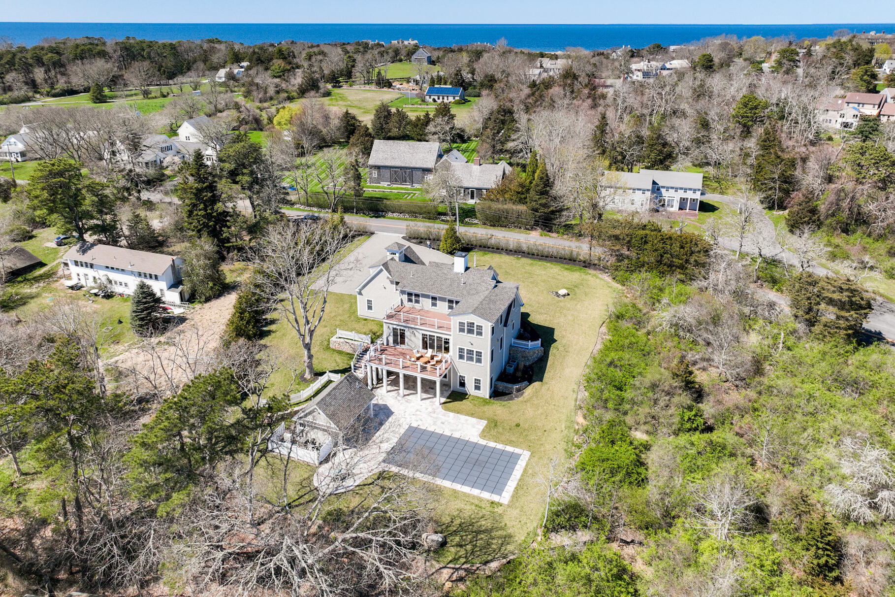 159 Sesuit Neck Road East Dennis, MA 02641 - Photo 76 of 78 an aerial view of residential houses with outdoor space