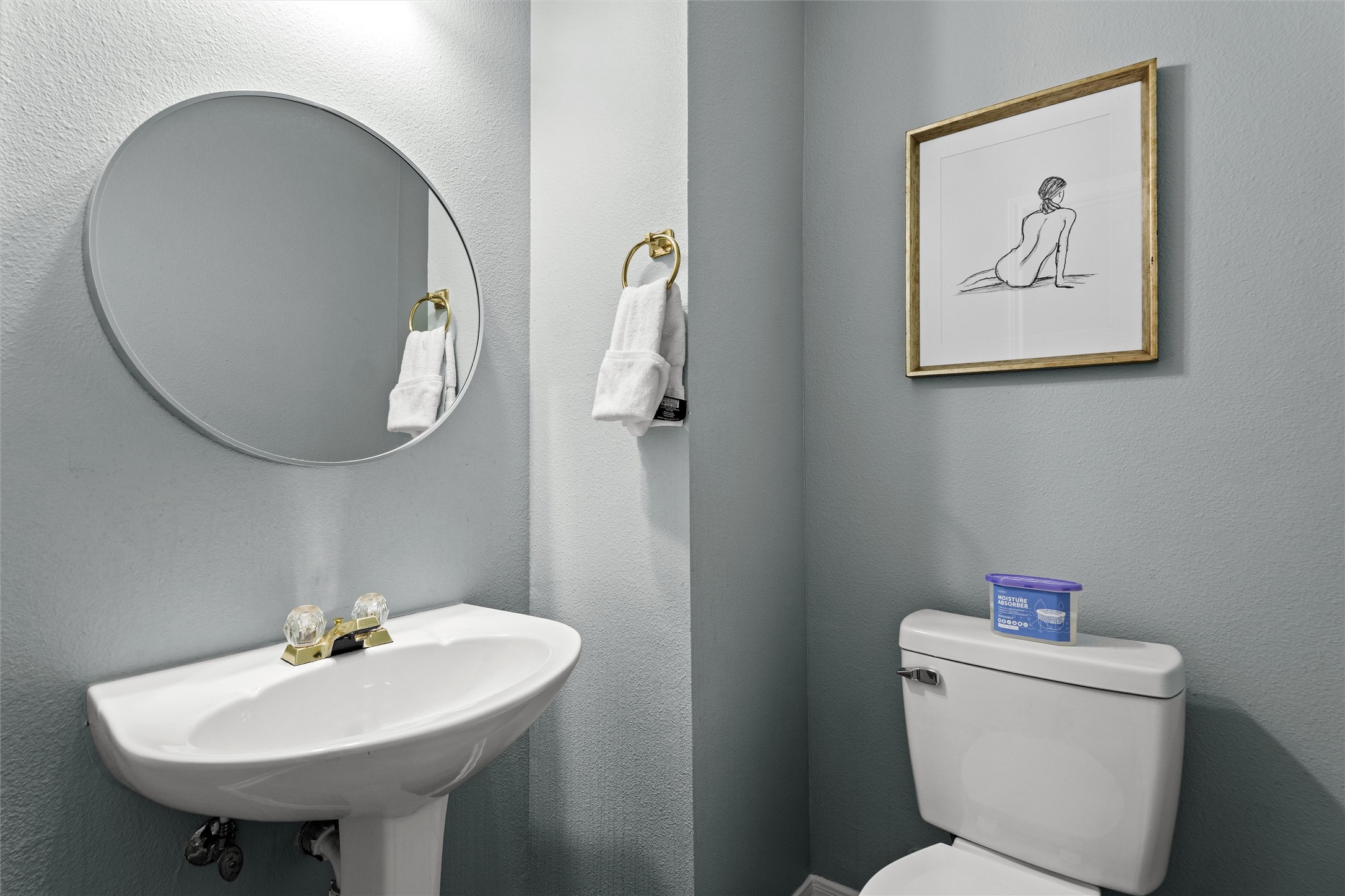 7000 Colberg Court Austin, TX 78749 - Photo 34 of 40 Half Bath has A well-appointed powder room features a classic pedestal sink and modern fixtures for convenience.