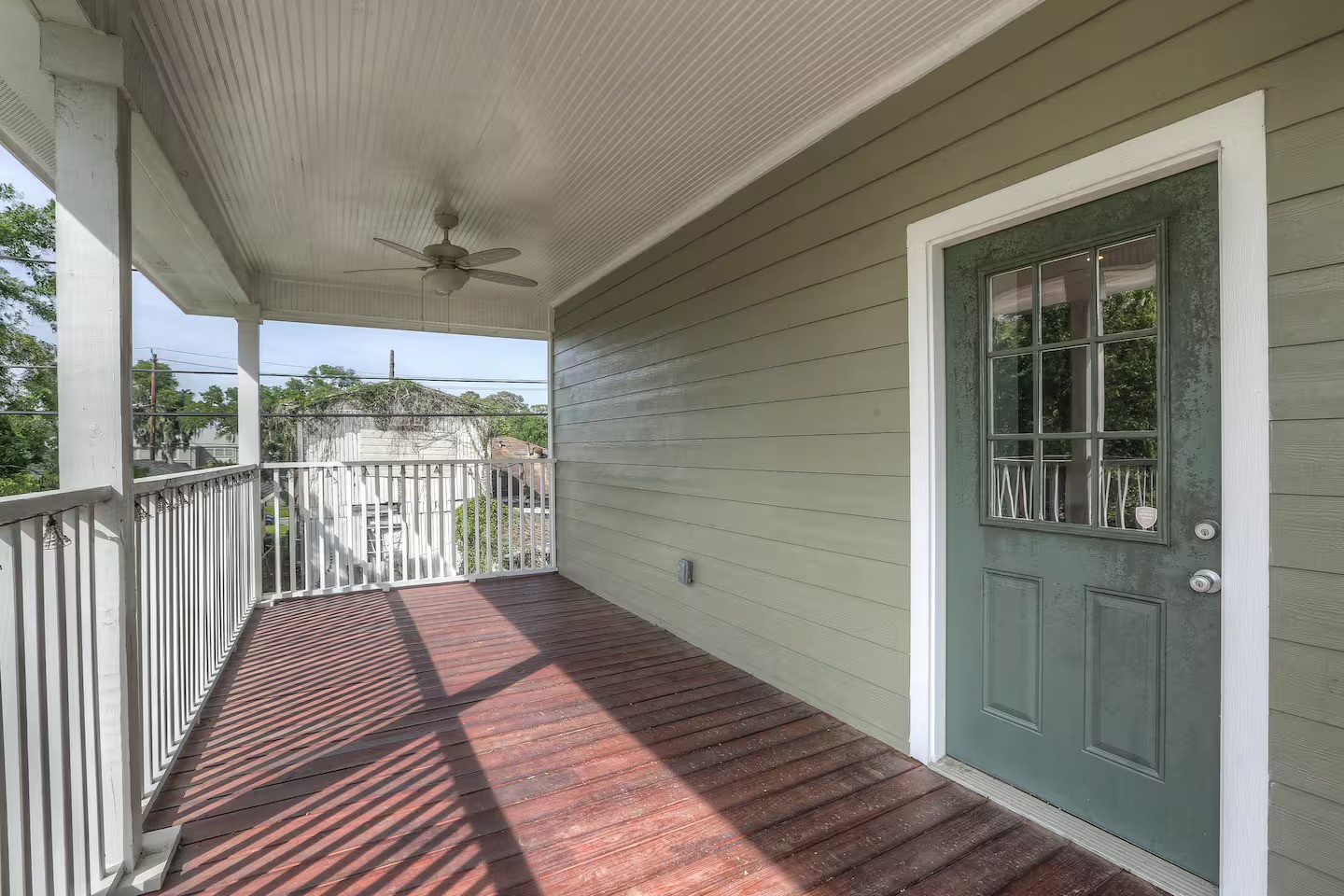 3523 Charleston Street Houston, TX 77021 - Photo 11 of 17 a balcony with wooden floor