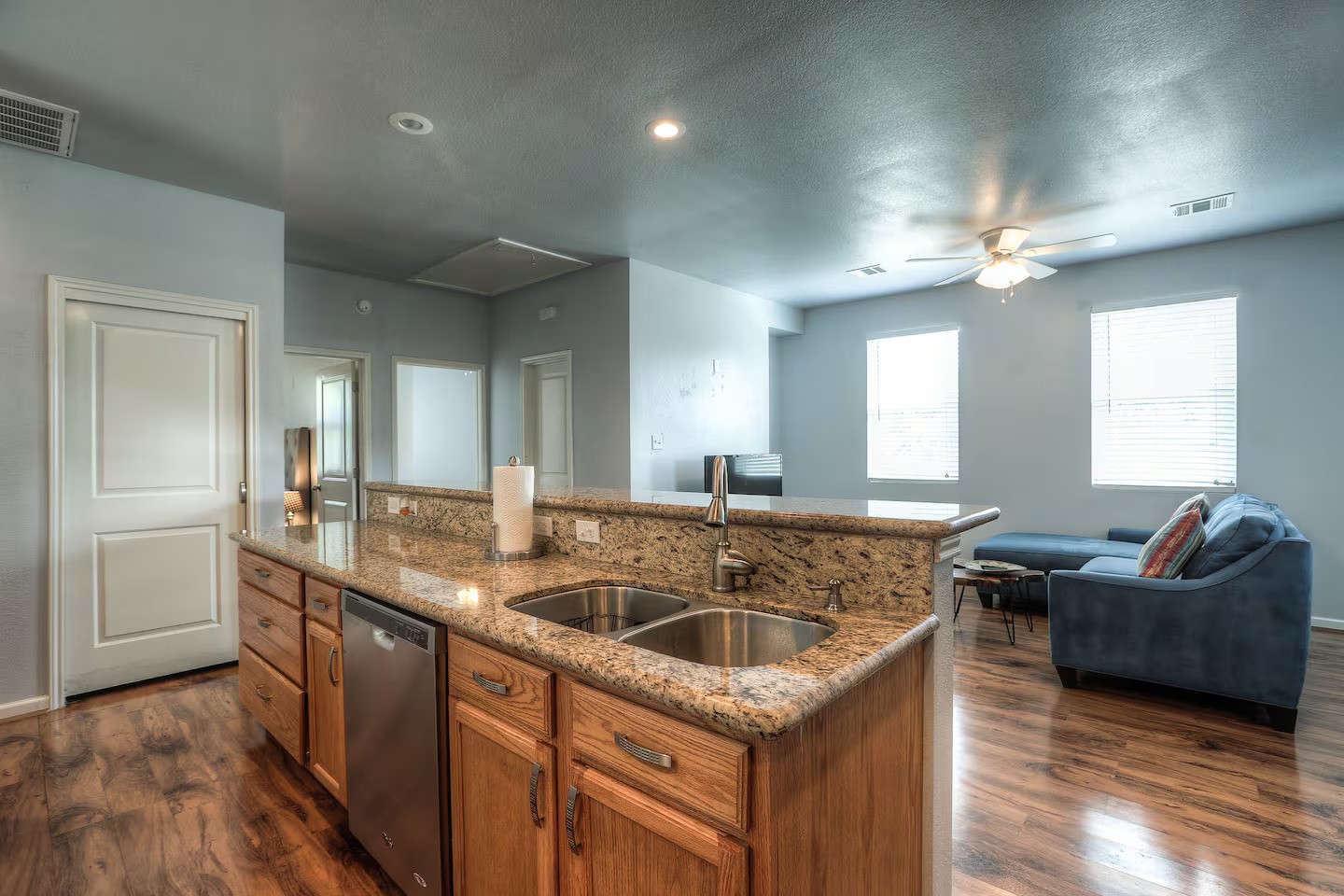 3523 Charleston Street Houston, TX 77021 - Photo 17 of 17 a view of a kitchen counter top a sink a window and living room