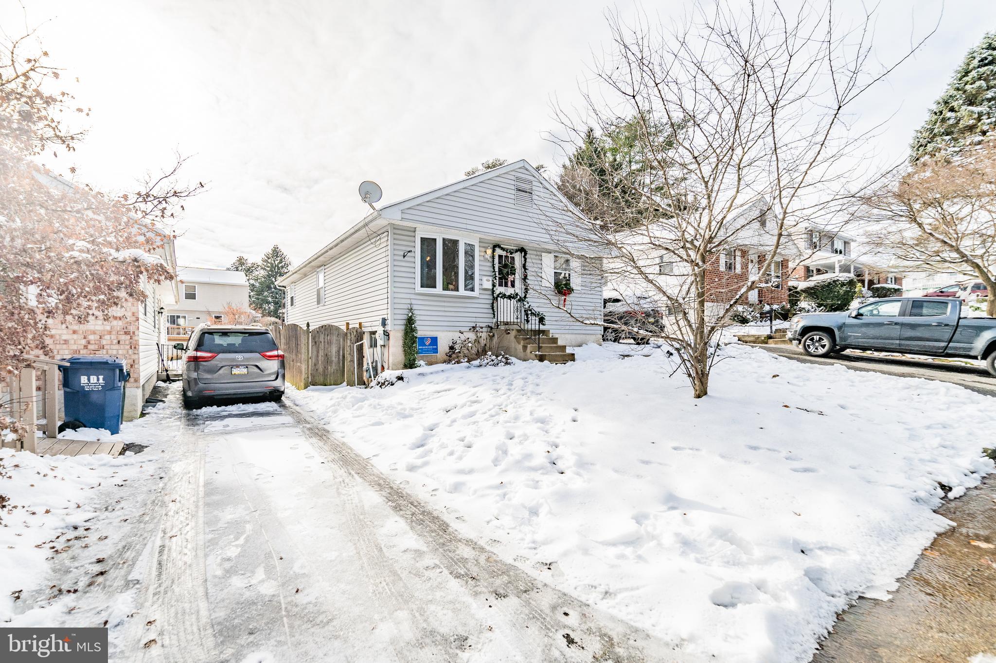 811 Pine Road Wallingford, PA 19086 - Photo 2 of 41 a view of street with a snow on the road