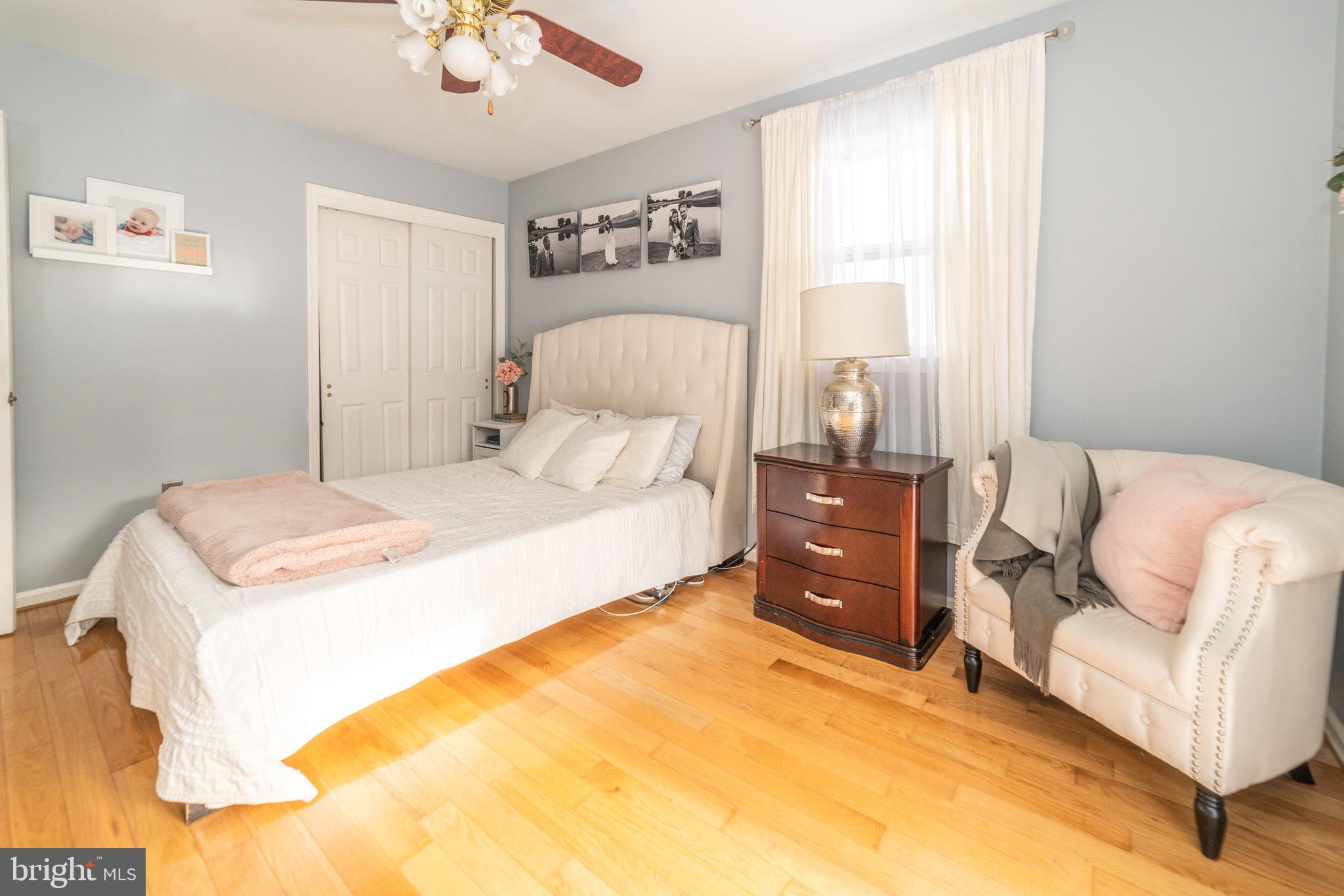 811 Pine Road Wallingford, PA 19086 - Photo 17 of 41 a bedroom with a bed and a couch