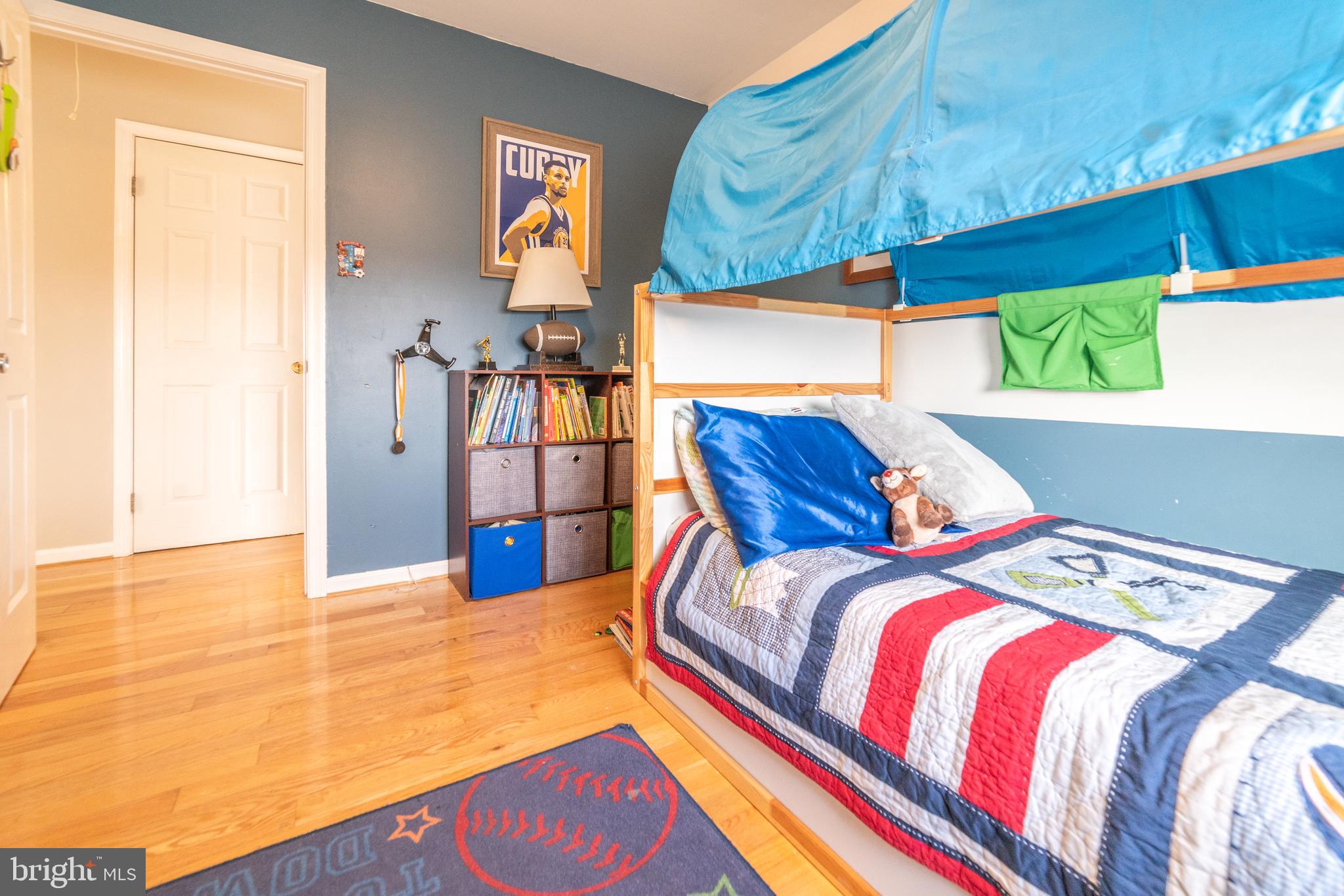 811 Pine Road Wallingford, PA 19086 - Photo 18 of 41 a bedroom with a bed and a painting on the wall