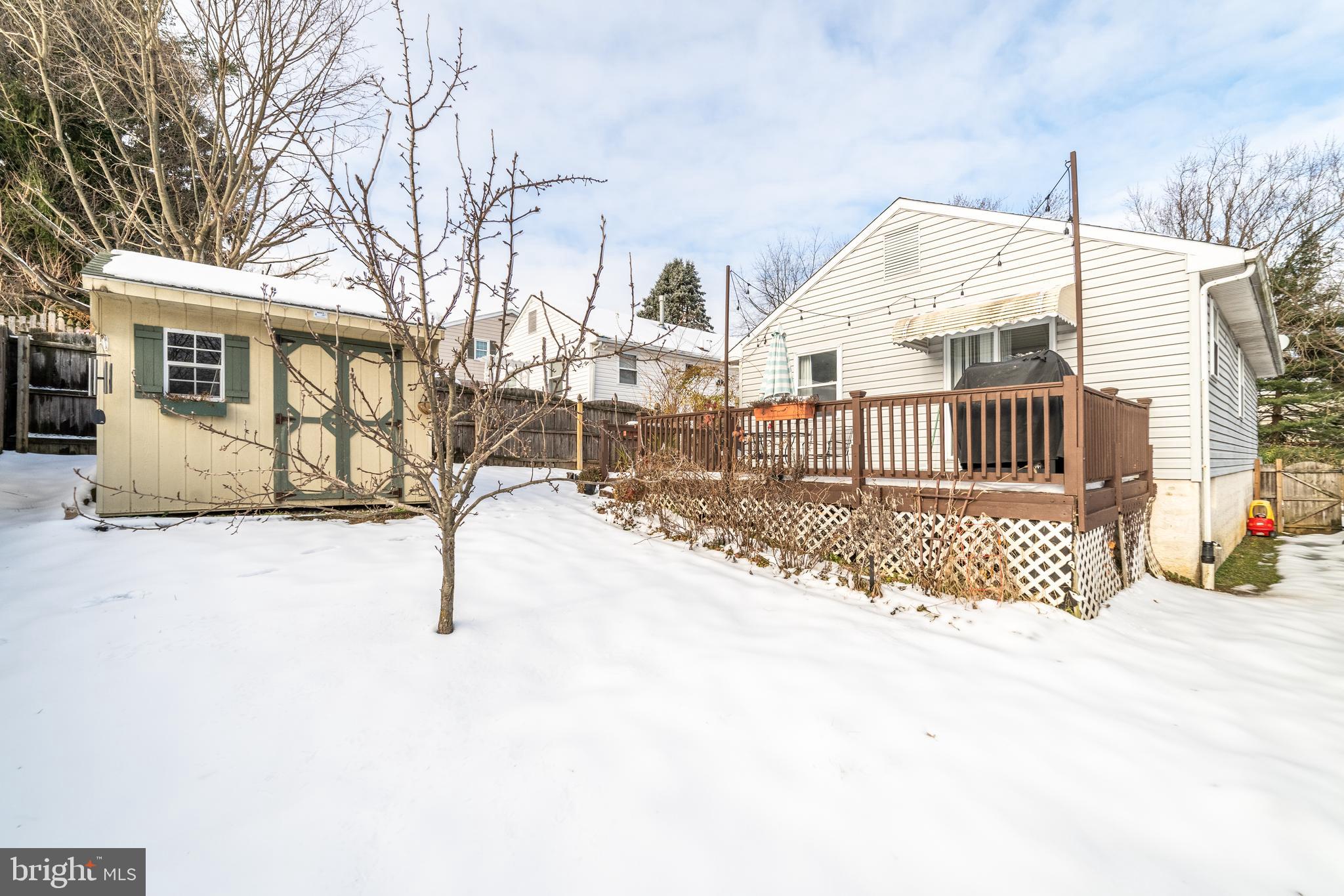 811 Pine Road Wallingford, PA 19086 - Photo 33 of 41 a view of a house with a snow in the yard