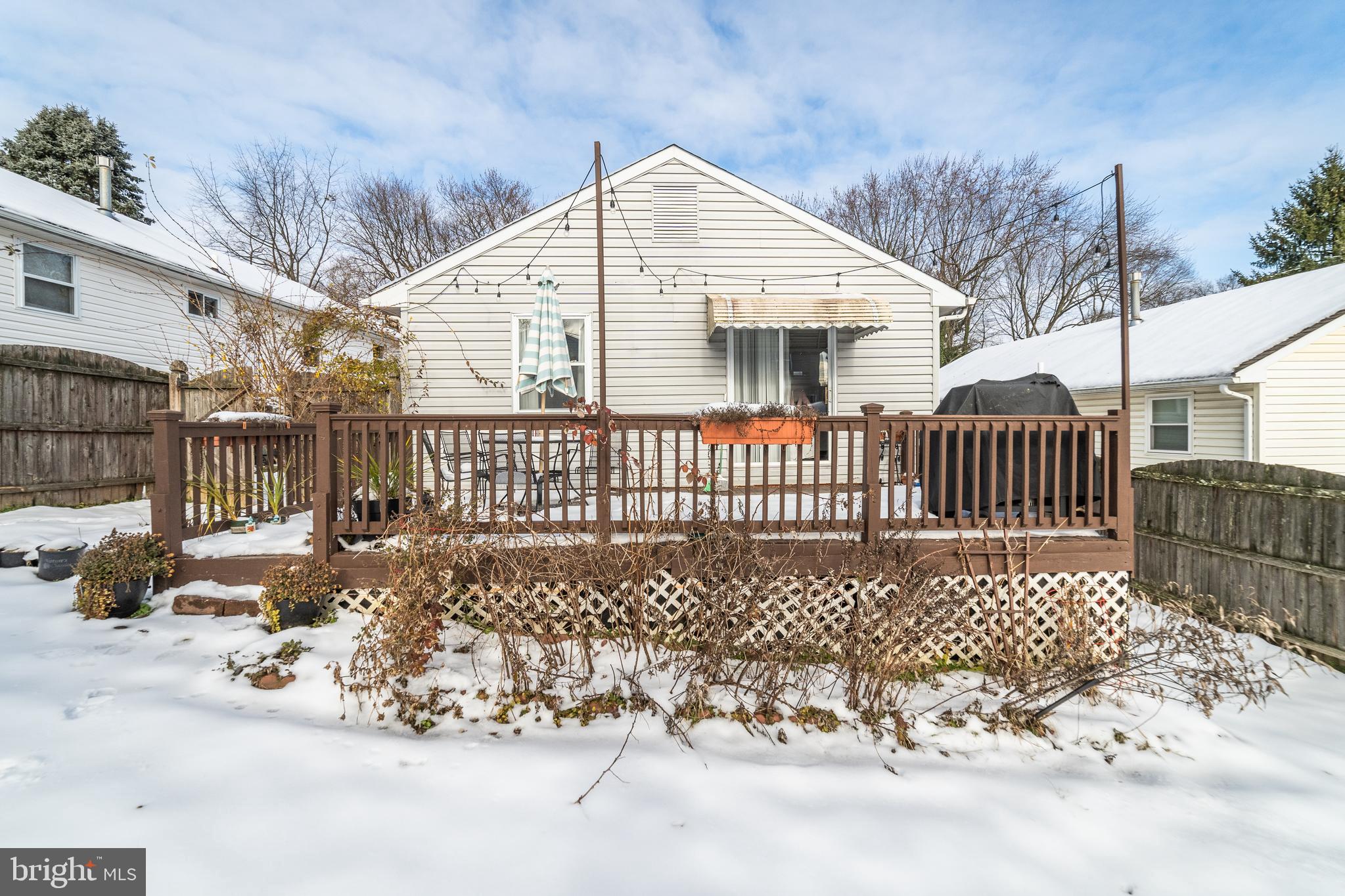 811 Pine Road Wallingford, PA 19086 - Photo 34 of 41 a view of a wooden house with a bench in the patio