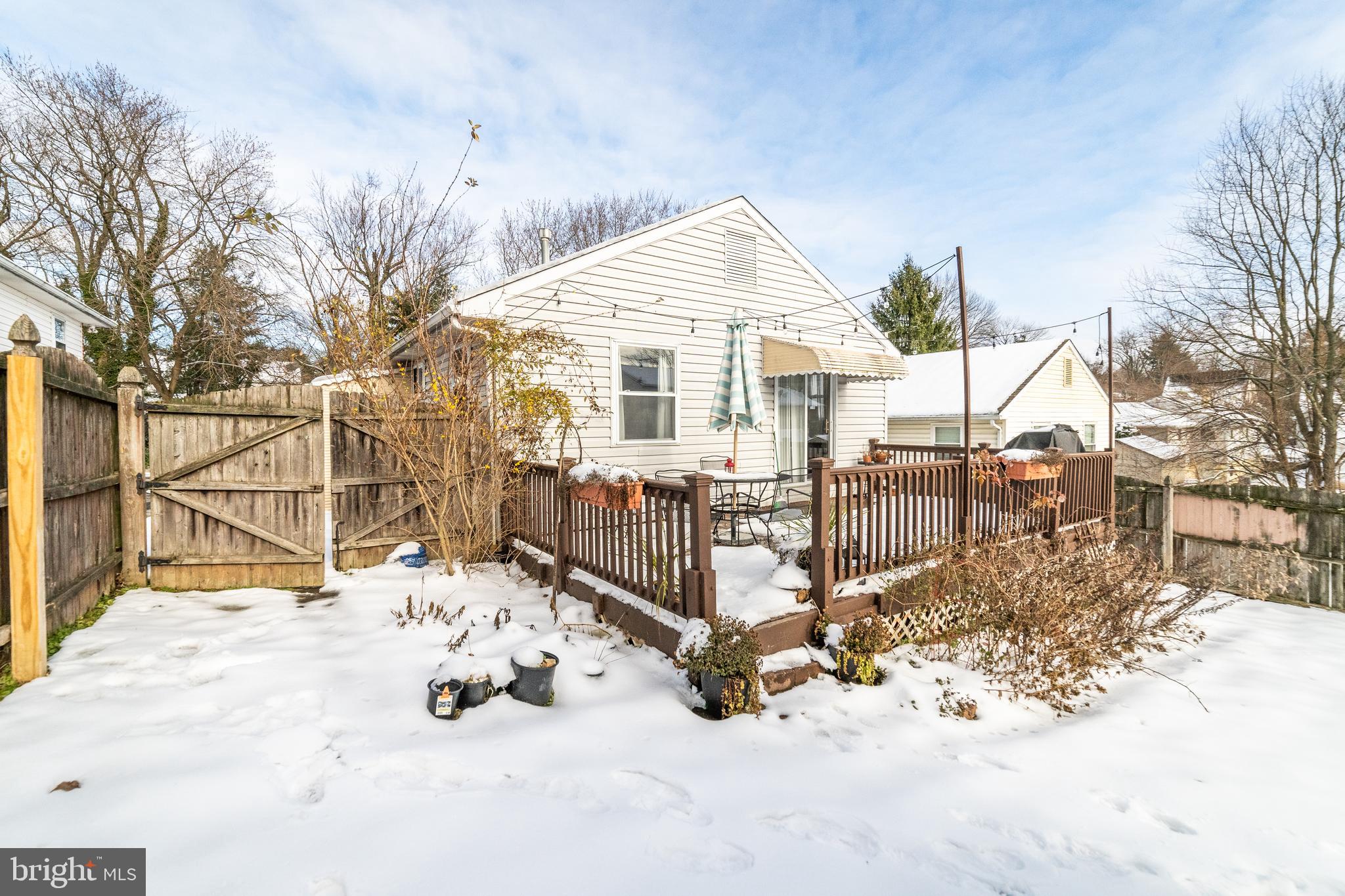 811 Pine Road Wallingford, PA 19086 - Photo 36 of 41 a view of a house with snow in the yard
