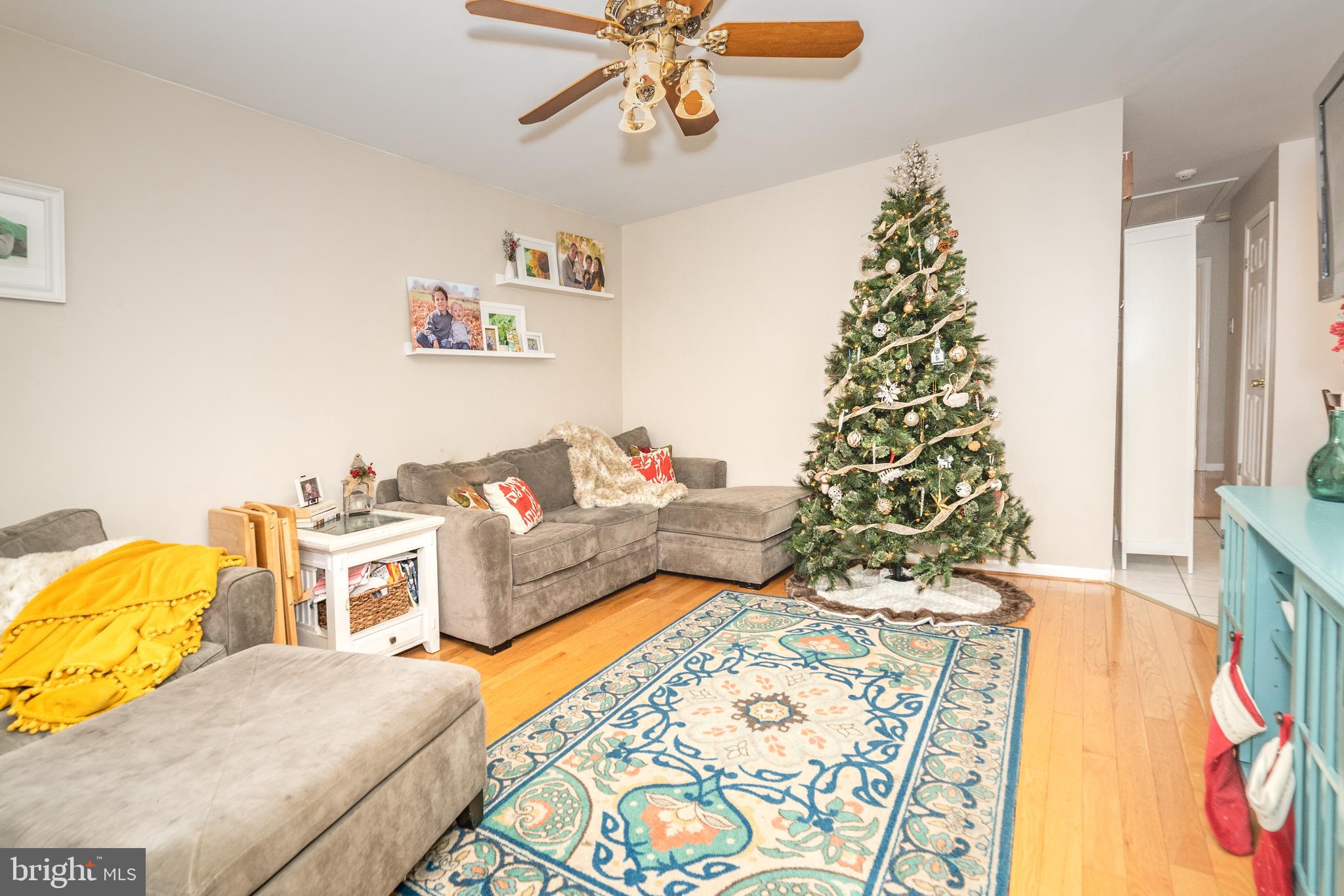 811 Pine Road Wallingford, PA 19086 - Photo 7 of 41 a bedroom with a bed and a chandelier