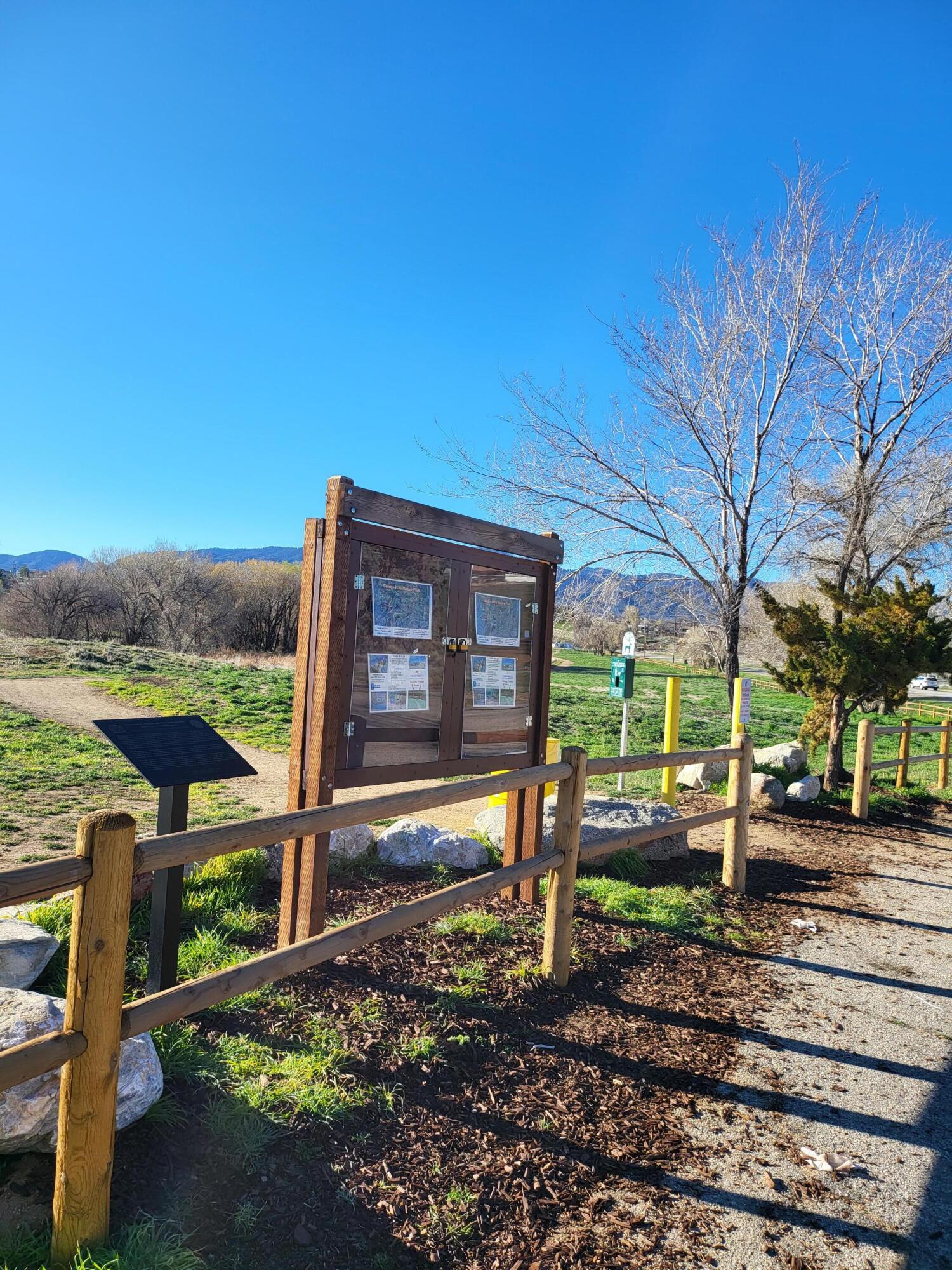 22500 Mariposa Road Tehachapi, CA 93561 - Photo 6 of 8 a view of a brick house with a yard