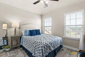 a view of a house with swimming pool and porch with furniture