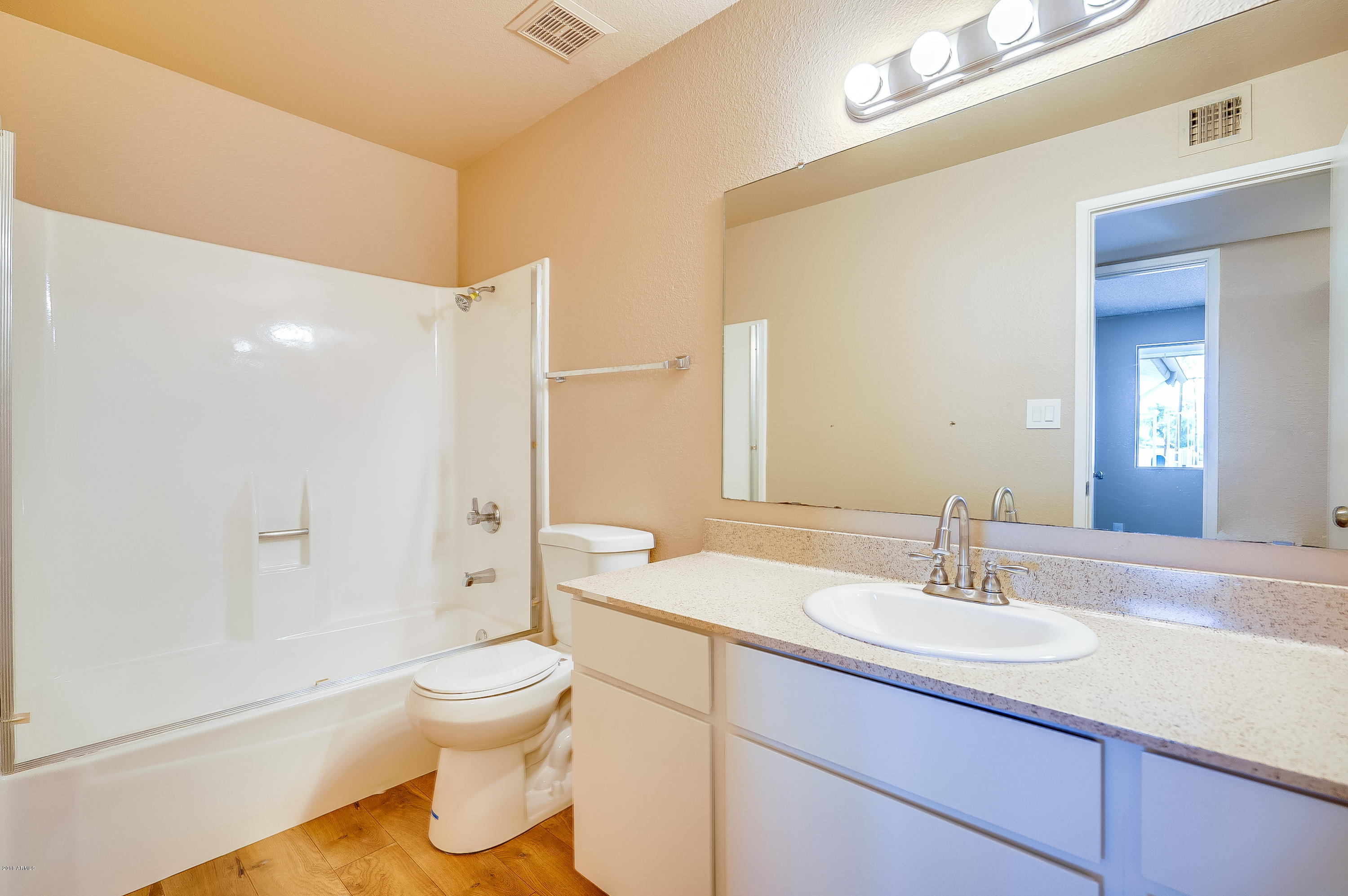 6509 West Camelback Road Phoenix, AZ 85033 - Photo 20 of 25 a bathroom with a sink a toilet and shower