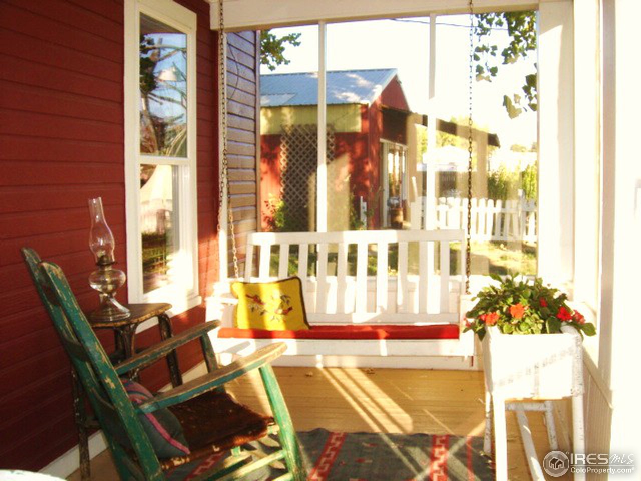 7453 Hygiene Road Longmont, CO 80503 - Photo 17 of 25 Porch swing