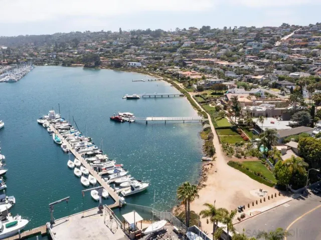 an aerial view of a house with outdoor space