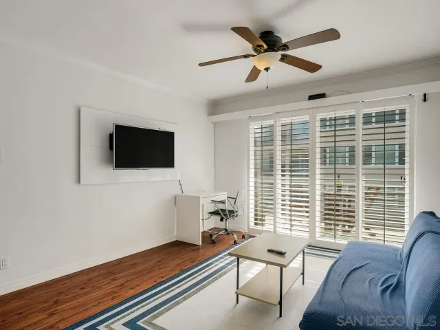 a work room with furniture and windows