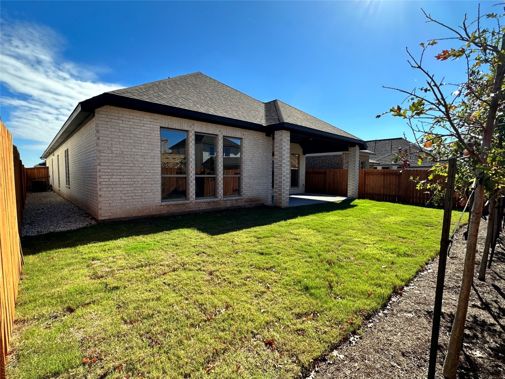 17309 Cain Clearing Pass Austin, TX 78738 - Photo 12 of 33 Just the right size level fenced yard.
