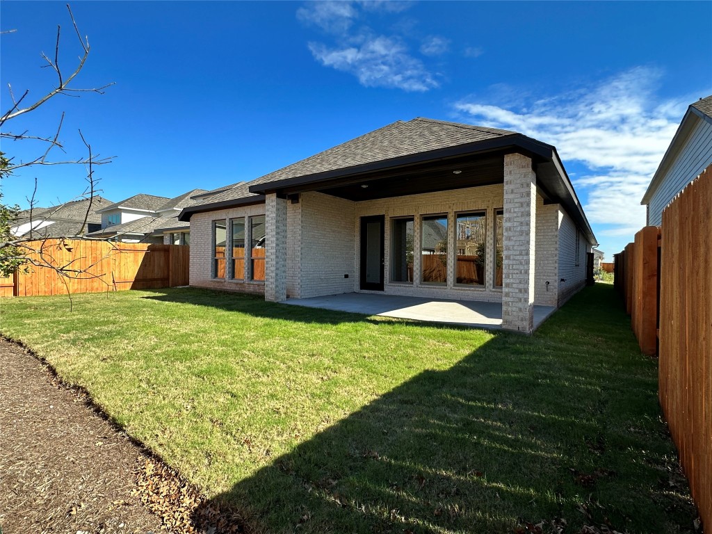 17309 Cain Clearing Pass Austin, TX 78738 - Photo 13 of 33 Fenced level yard and covered patio