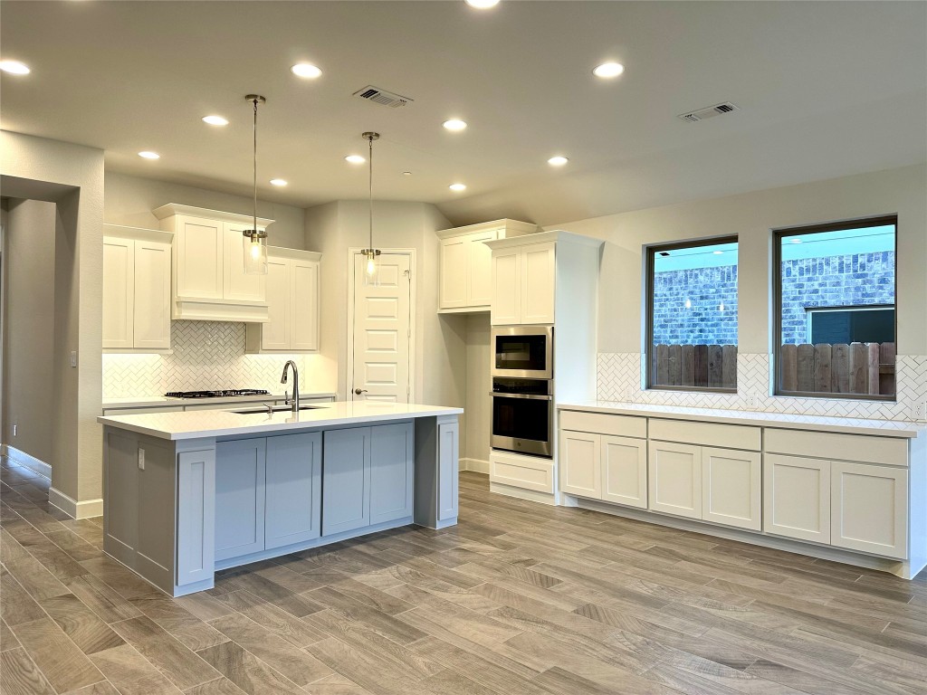 17309 Cain Clearing Pass Austin, TX 78738 - Photo 5 of 33 Kitchen/Dining with plenty of storage