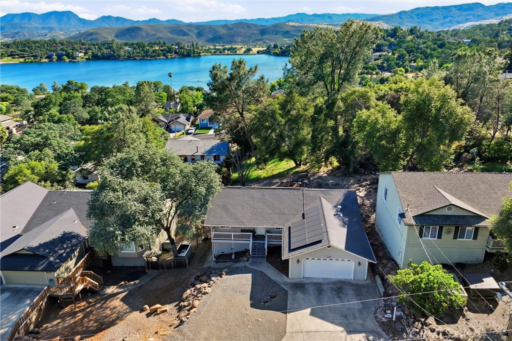 18685 Oak Grove Road Hidden Valley Lake, CA 95467 - Photo 38 of 52 an aerial view of a house with garden space and lake view