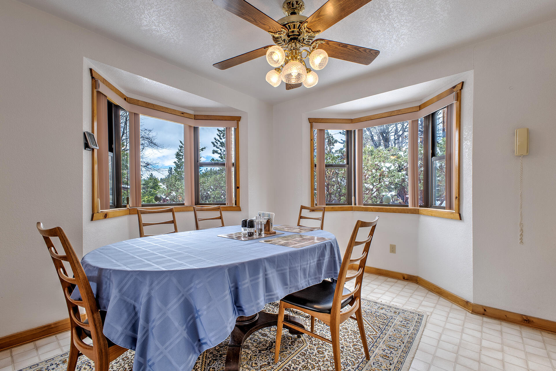 25006 Knob-Hill Idyllwild, CA 92549 - Photo 19 of 47 a view of a dining room with furniture window and outside view