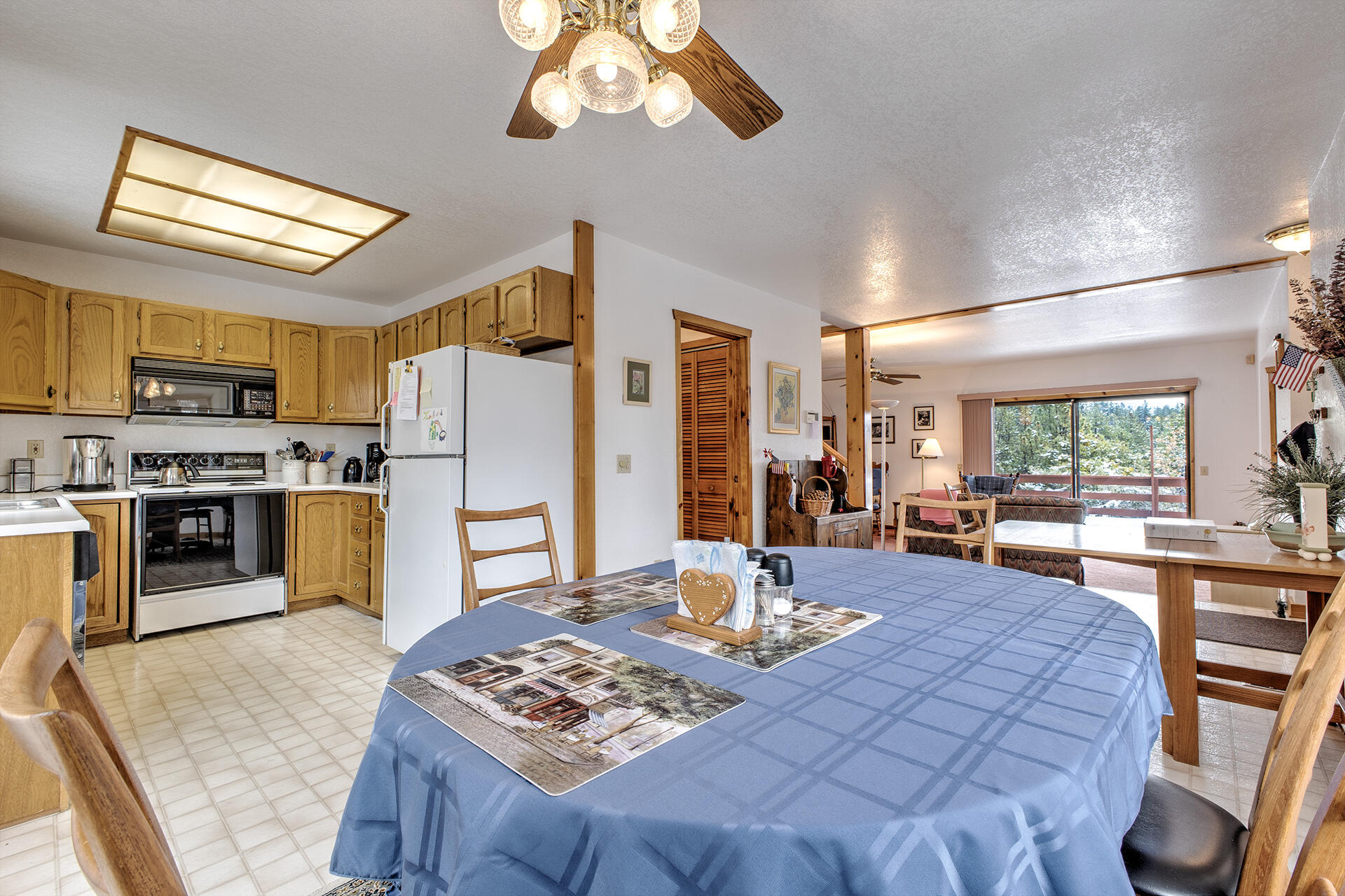 25006 Knob-Hill Idyllwild, CA 92549 - Photo 21 of 47 a living room with stainless steel appliances kitchen island granite countertop furniture and a kitchen view