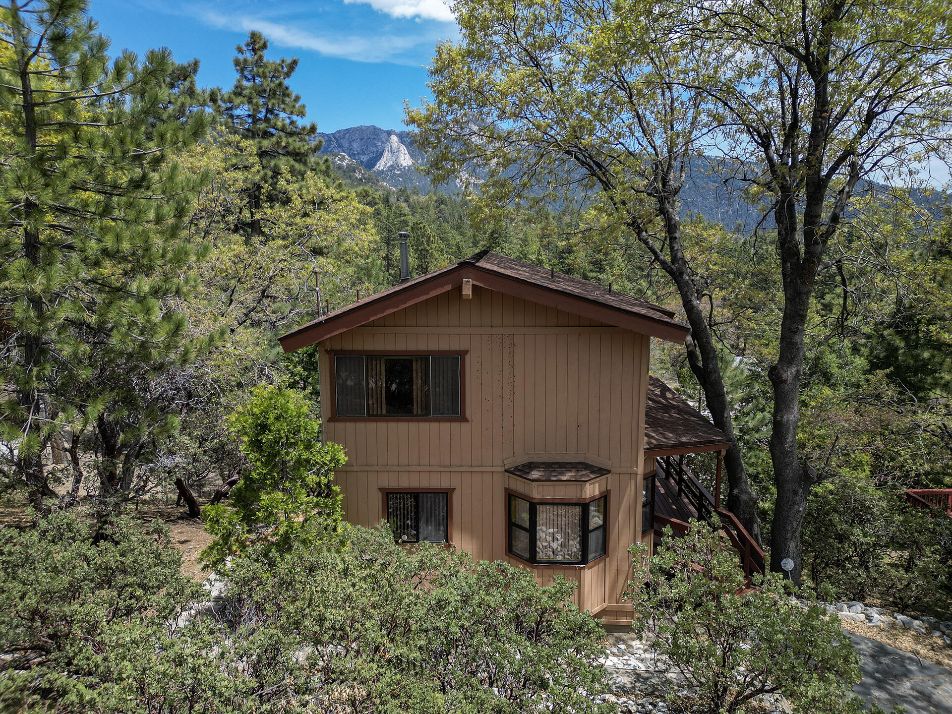 25006 Knob-Hill Idyllwild, CA 92549 - Photo 3 of 47 a view of a house with a yard