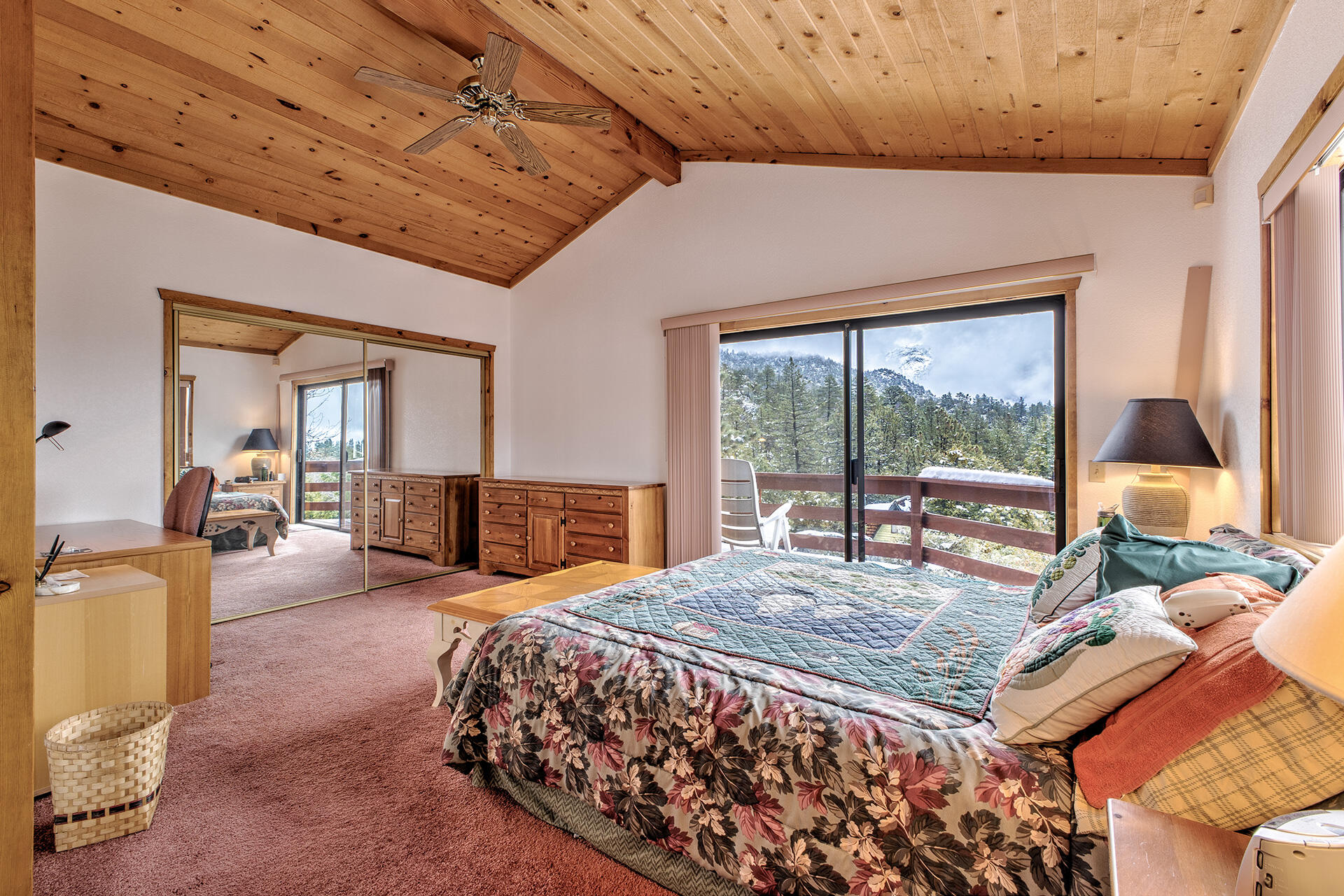 25006 Knob-Hill Idyllwild, CA 92549 - Photo 34 of 47 a bed sitting in a spacious bedroom next to a window