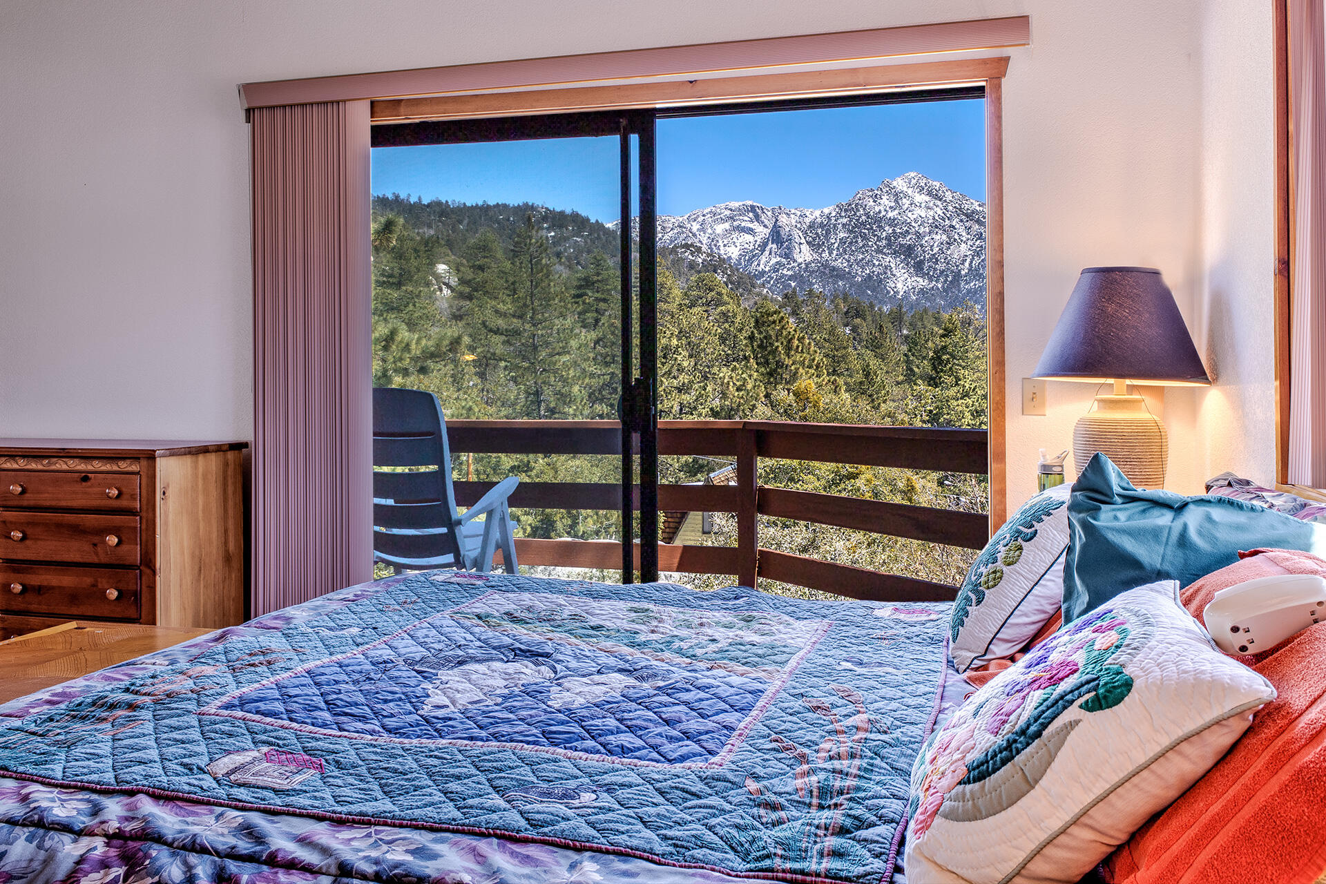 25006 Knob-Hill Idyllwild, CA 92549 - Photo 36 of 47 a bedroom with a bed and a flat screen tv