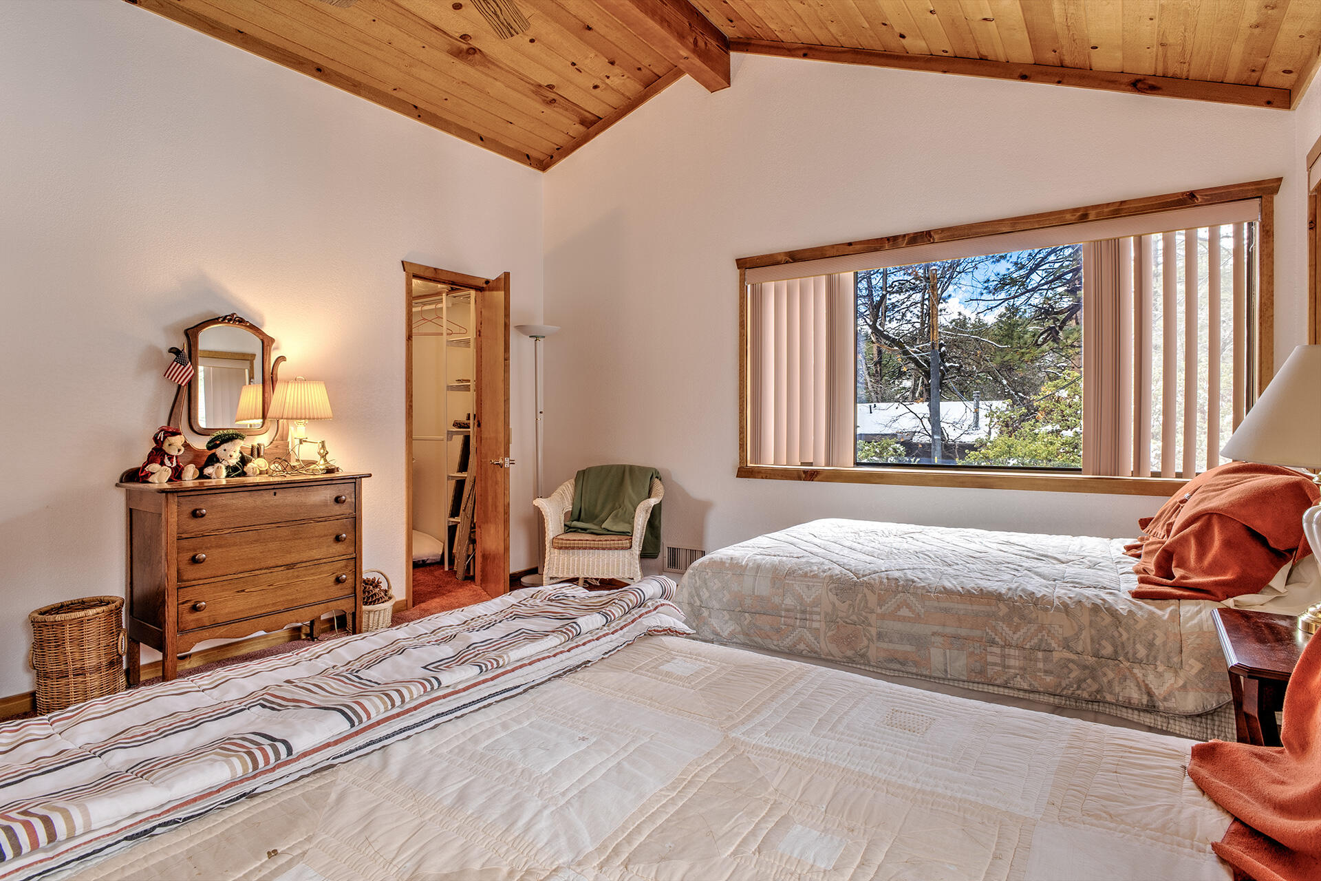 25006 Knob-Hill Idyllwild, CA 92549 - Photo 43 of 47 a bedroom with a bed and wooden floor