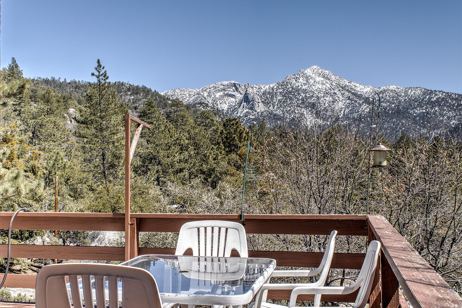 25006 Knob-Hill Idyllwild, CA 92549 - Photo 10 of 47 a view of a roof deck with table and chairs
