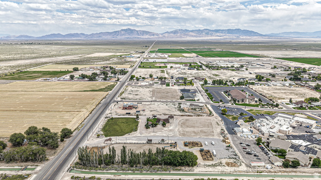 84 White Sage Avenue, Unit 2 Delta, UT 84624 - Photo 2 of 18 Expansive aerial perspective showcasing a rural landscape with distant mountains