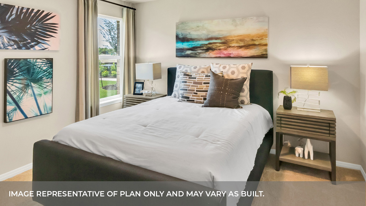 1908 Bandito Bluff Pass Leander, TX 78641 - Photo 21 of 29 a bedroom with a bed and wooden floor